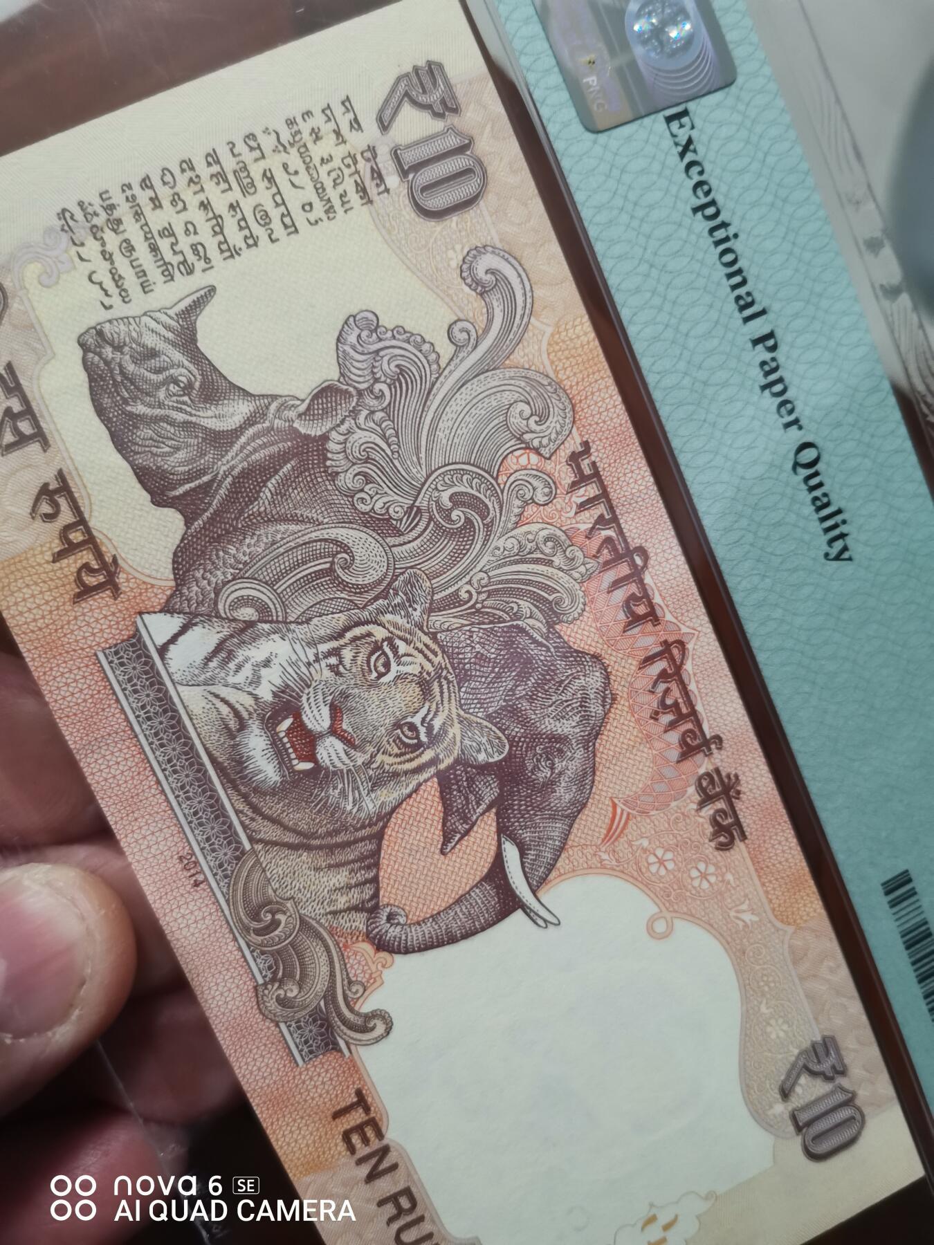 2014年 印度储备银行10卢比纸币，PMG评级64分，Choice Uncirculated，全同号79C 222222，Letter A版。票面保存完好，几乎全新，收藏级别，品相漂亮，适合钱币收藏爱好者。  评级币，保真包老，非流通外币，收藏价值高。评级机构为PMG，编号2399936902G。  包邮，同城可自提。售出不退不换，不议价。