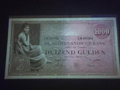 2026四月第三期，总第224期 荷兰1926年1000盾UNC- 经典的最高面值 正面是寓意丰收/贸易的女性形象，周围环绕着繁复的花卉与卷草纹饰和生命之蛇，收藏价值极高