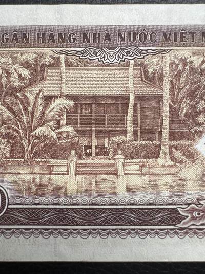 桂P钱币文化工作室拍卖第五十期 越南1994年版10万盾，全新UNC，该套币的最大面值，代表当时越南印钞最高工艺水平的一张纸钞