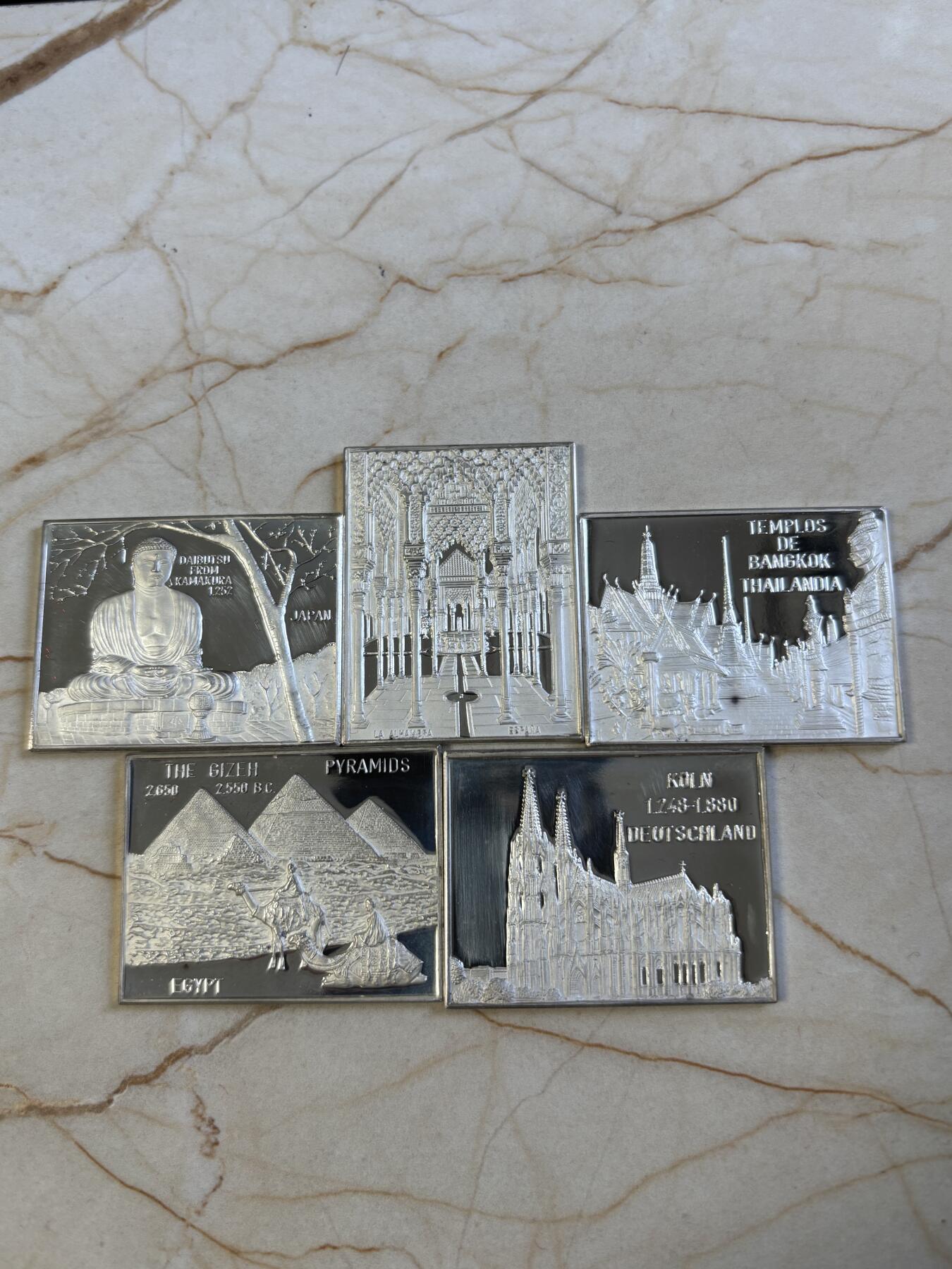 第197期拍卖 世界著名景点纪念纯银章一组十枚，单枚39.5*30.5毫米，总重约140.1克带银戳