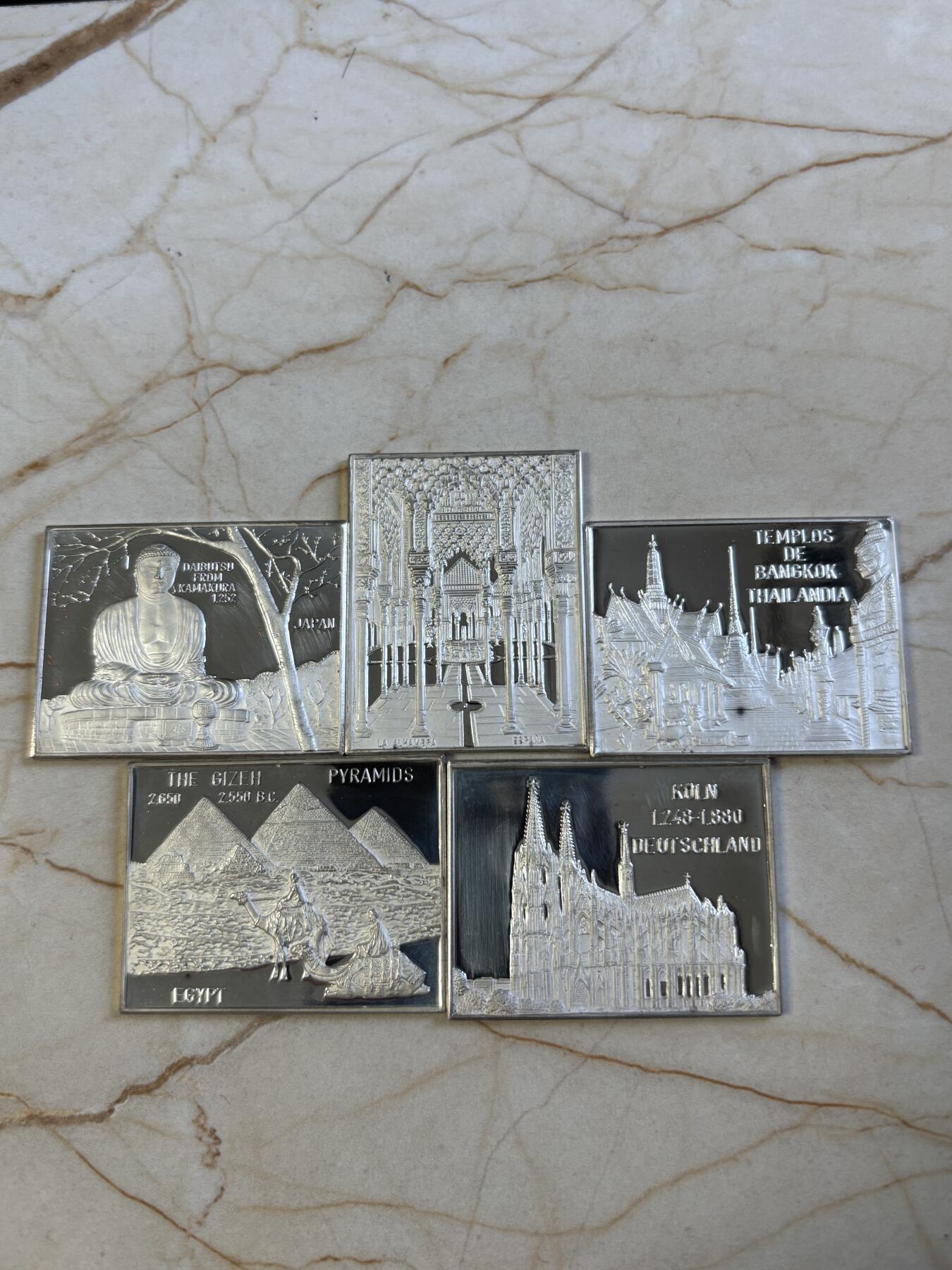 第197期拍卖 世界著名景点纪念纯银章一组十枚，单枚39.5*30.5毫米，总重约140.1克带银戳