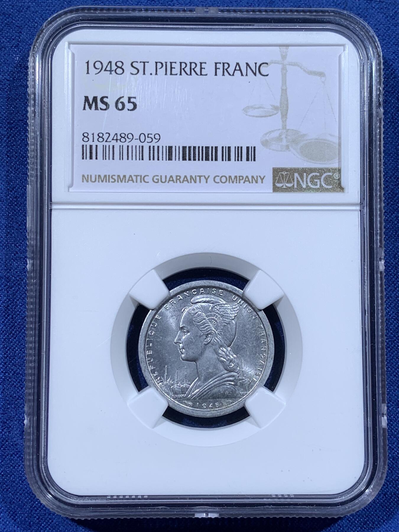 《竞宝斋》第481场 周日，周一 2场连拍 （全场包邮）20级店铺 欢迎送拍 NGC MS65 法属圣皮埃尔和密克隆1948年1法郎铝币 转光品相 少见法属地区 热门