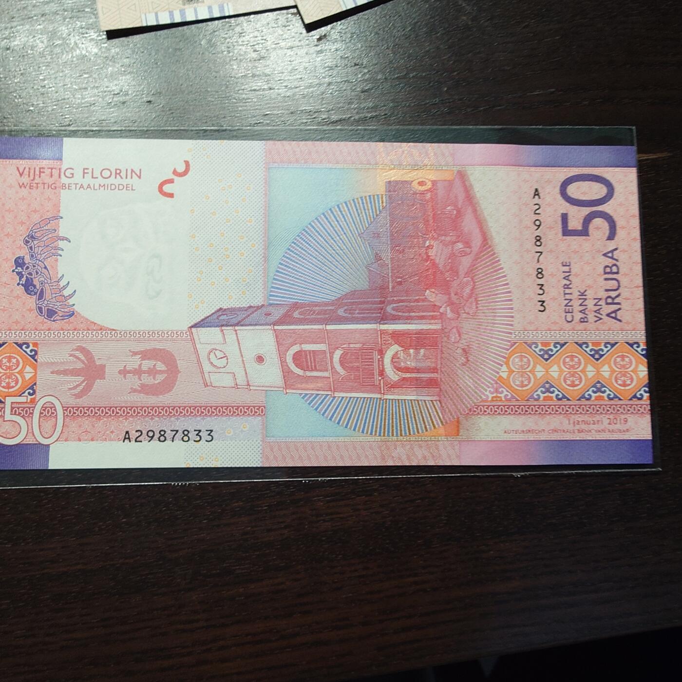 世界钱币～微拍第245期暨2026年第26期  新货卖剩品种部分上架提供选购【有看中的就一开始就出价，别为了晚付几天押金拖到最后，这里没出价的只要群里卖掉了就会撤】 2019年阿鲁巴50元 全新绝品无4尾号833