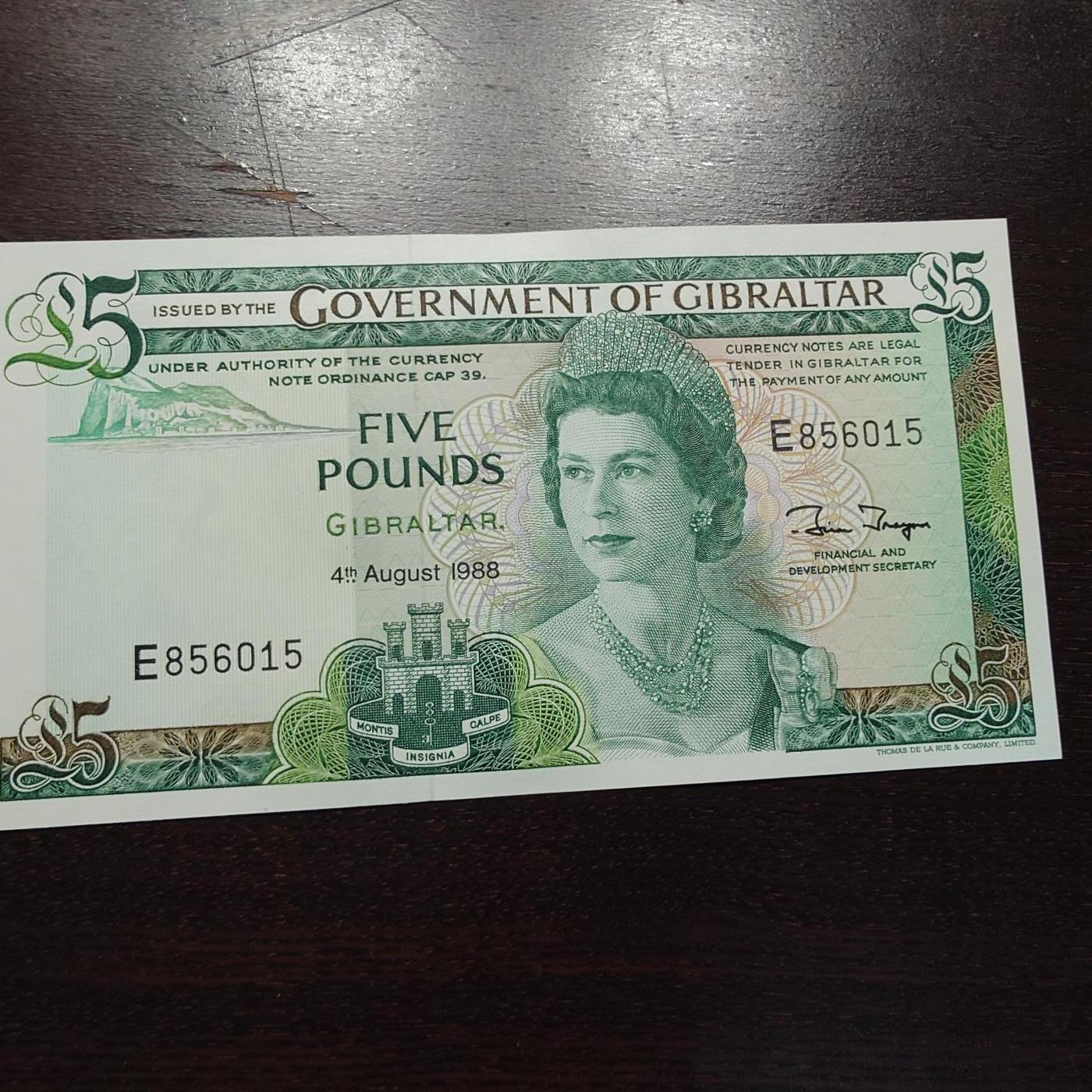 世界钱币～微拍第245期暨2026年第26期  新货卖剩品种部分上架提供选购【有看中的就一开始就出价，别为了晚付几天押金拖到最后，这里没出价的只要群里卖掉了就会撤】 1988年直布罗陀5镑 全新绝品无47尾号015