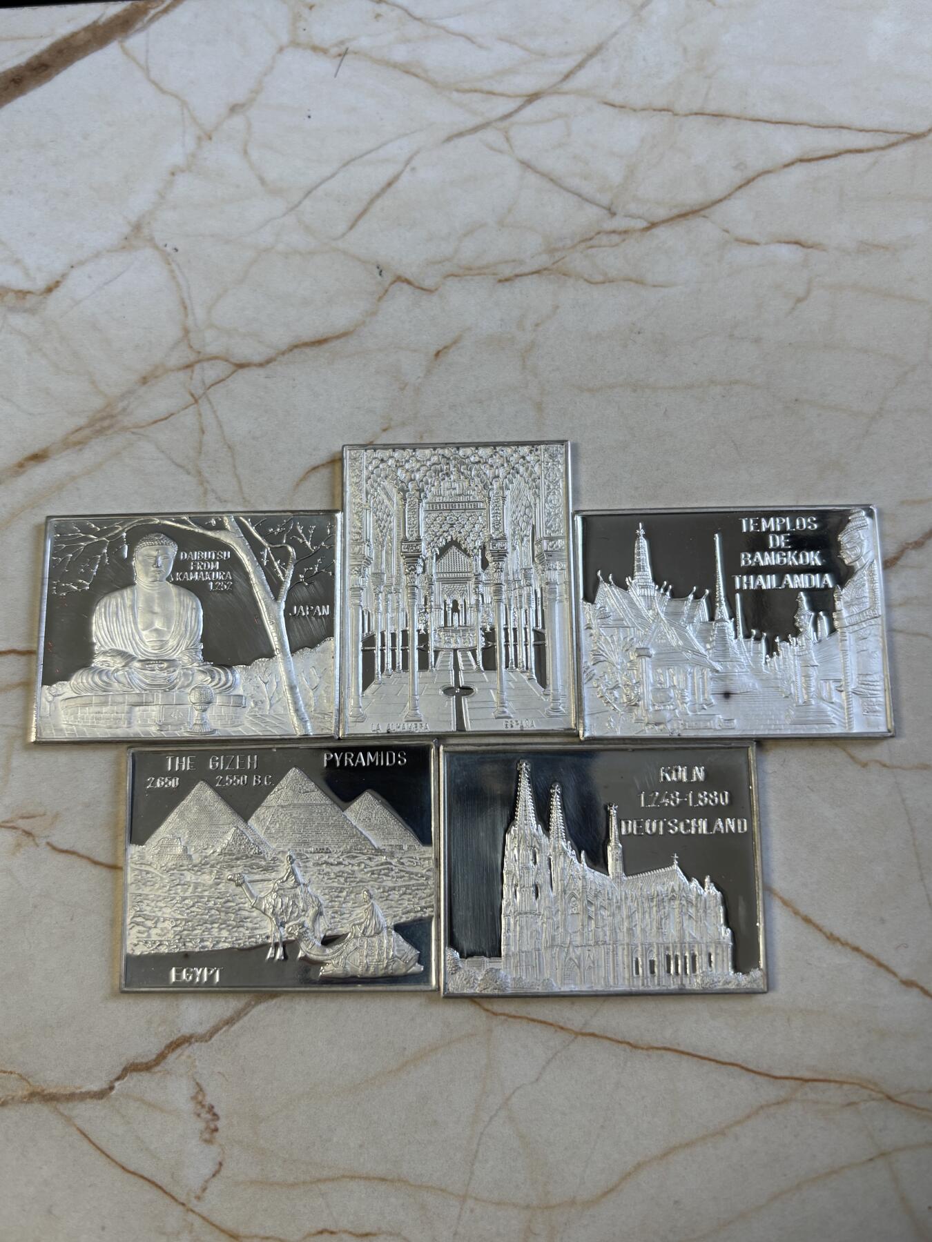 第197期拍卖 世界著名景点纪念纯银章一组十枚，单枚39.5*30.5毫米，总重约140.1克带银戳