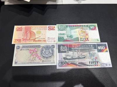 《外钞收藏家》第六百二十八期（精品百拍场）（长期征集拍品、欢迎藏友们联系合作） - 新加坡花和船版1-50元 四张一起 非全新 品相如图