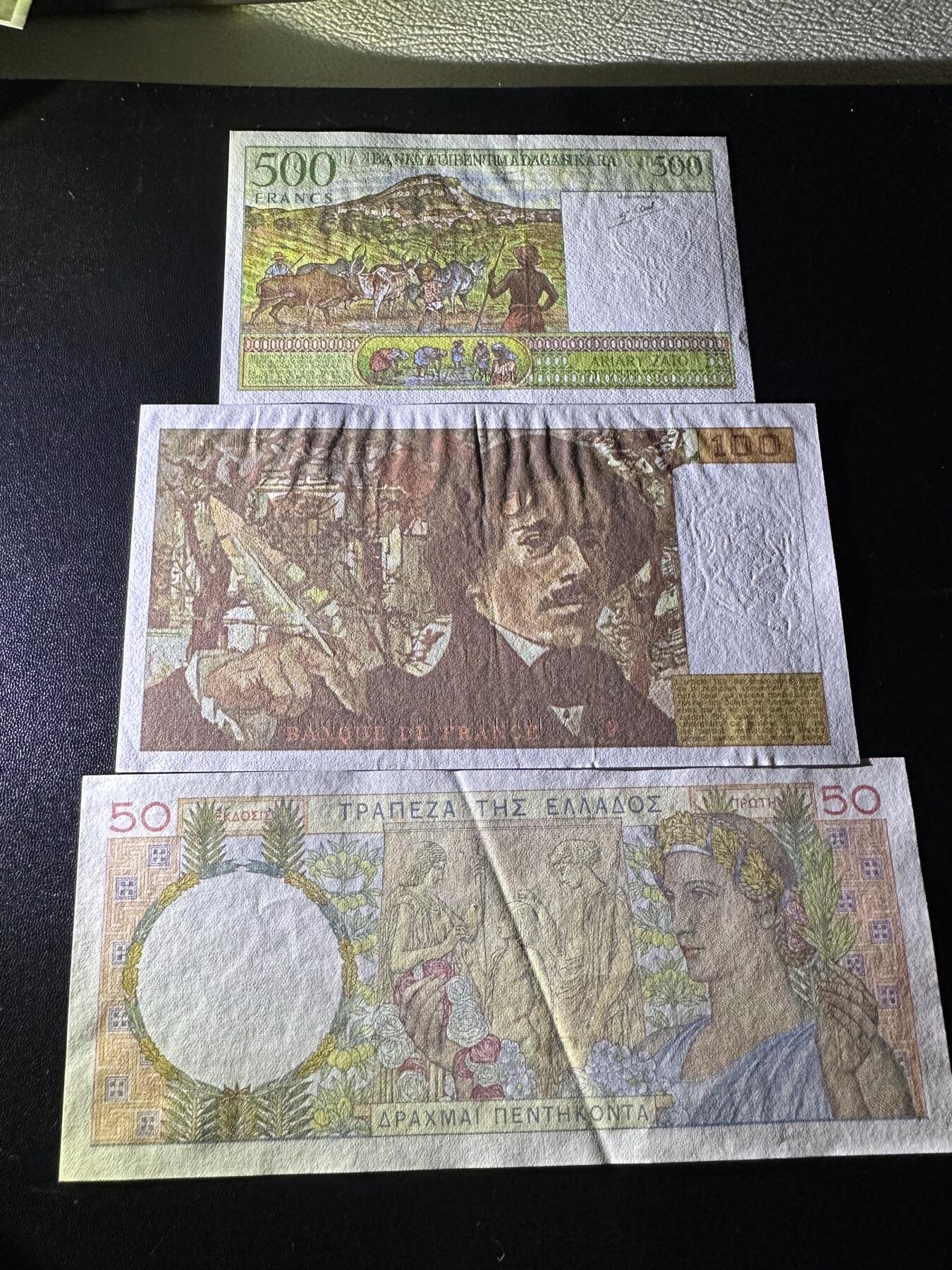 《外钞收藏家》第六百二十八期（精品百拍场）（长期征集拍品、欢迎藏友们联系合作） 马达加斯加500法郎全新、法国100法郎UNC-、希腊50AU有针孔