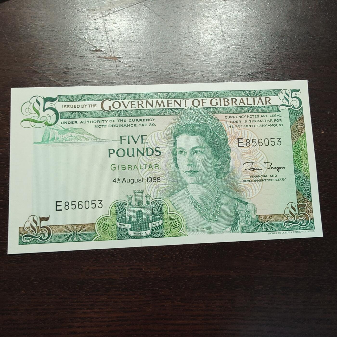 世界钱币～微拍第245期暨2026年第26期  新货卖剩品种部分上架提供选购【有看中的就一开始就出价，别为了晚付几天押金拖到最后，这里没出价的只要群里卖掉了就会撤】 1988年直布罗陀5镑 全新绝品无47尾号053