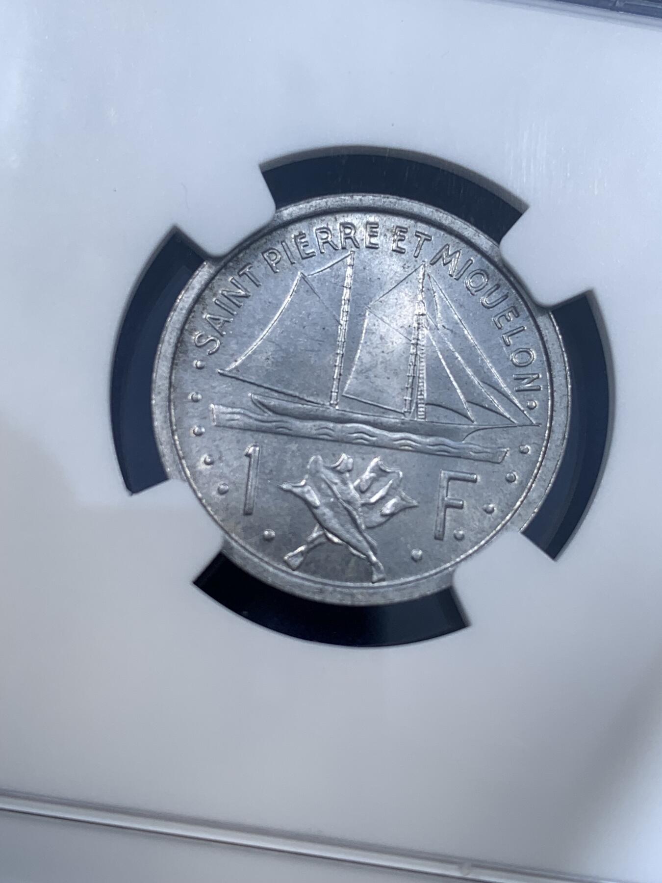 《竞宝斋》第481场 周日，周一 2场连拍 （全场包邮）20级店铺 欢迎送拍 NGC MS65 法属圣皮埃尔和密克隆1948年1法郎铝币 转光品相 少见法属地区 热门