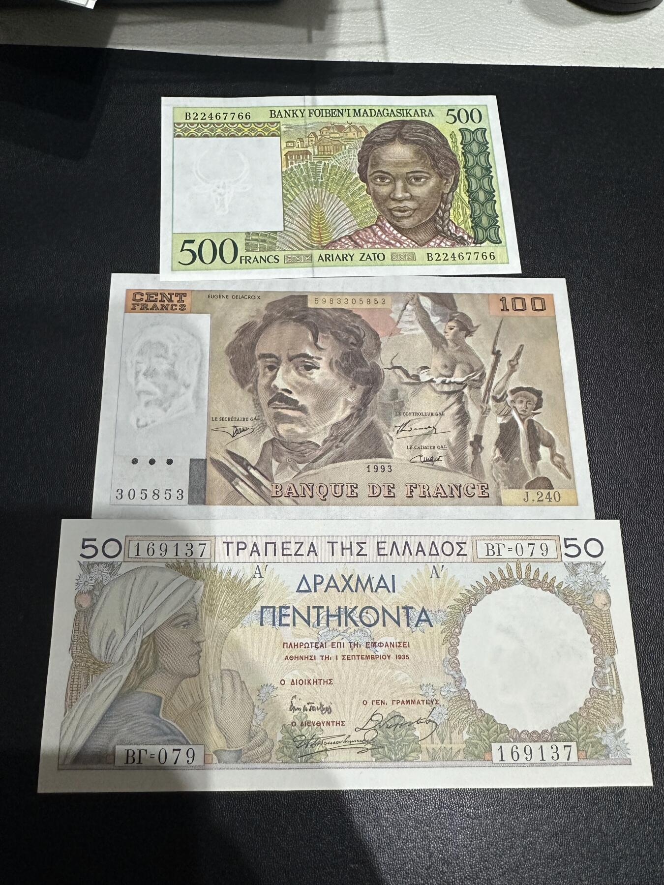 《外钞收藏家》第六百二十八期（精品百拍场）（长期征集拍品、欢迎藏友们联系合作） 马达加斯加500法郎全新、法国100法郎UNC-、希腊50AU有针孔