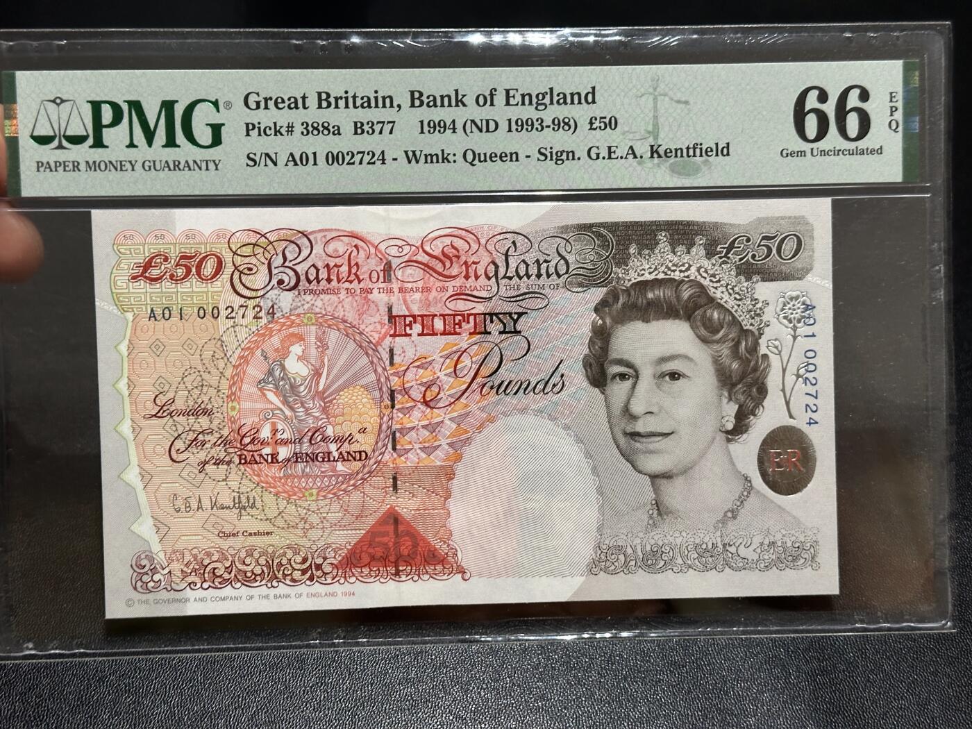 《外钞收藏家》第六百二十八期（精品百拍场）（长期征集拍品、欢迎藏友们联系合作） 英国E序列50镑 PMG66 首发A01冠 千位号