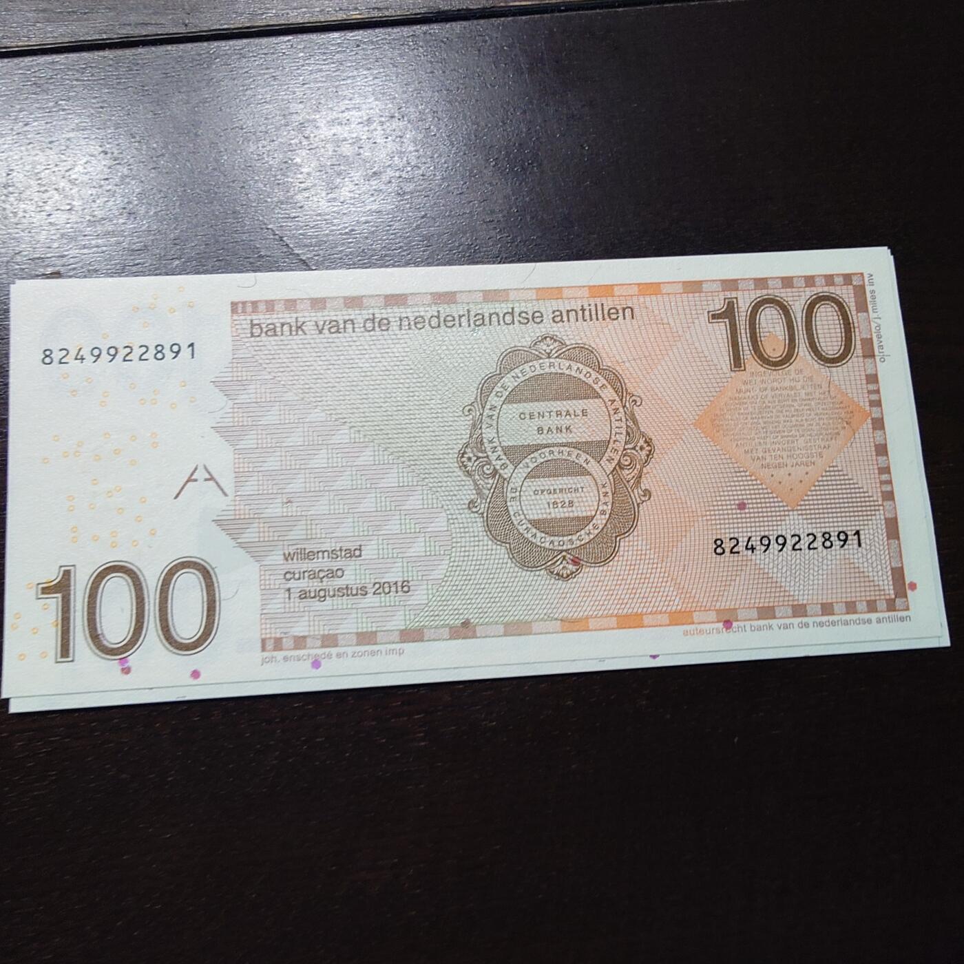 世界钱币～微拍第245期暨2026年第26期  新货卖剩品种部分上架提供选购【有看中的就一开始就出价，别为了晚付几天押金拖到最后，这里没出价的只要群里卖掉了就会撤】 【一口价已售出】2016年荷属安地列斯群岛100盾 全新绝品尾号891