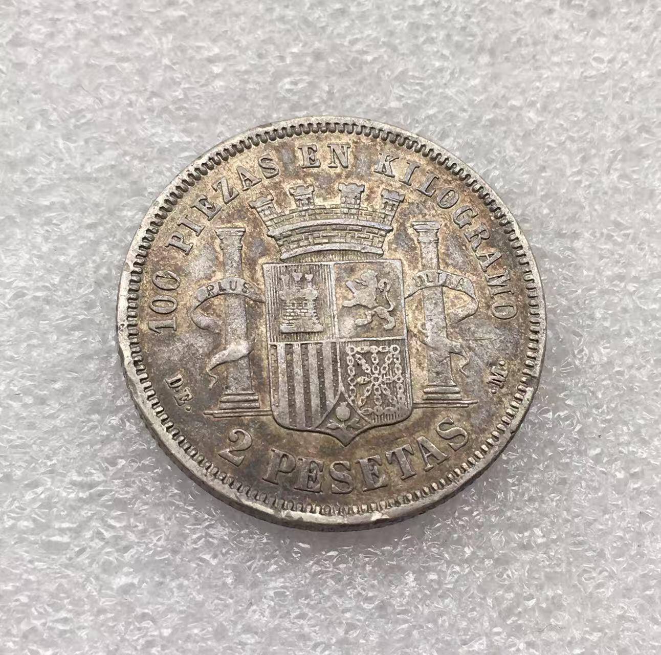 世界钱币专场拍卖 每周二开拍 1870年西班牙拿花女神2比赛塔双柱银币