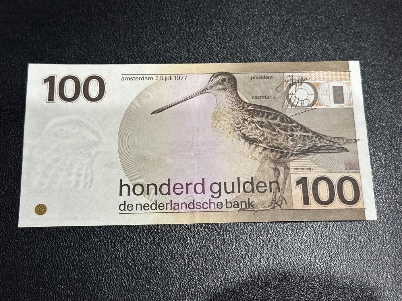 《外钞收藏家》第六百二十八期（精品百拍场）（长期征集拍品、欢迎藏友们联系合作） 1977年荷兰100盾 水鸟 AU品相