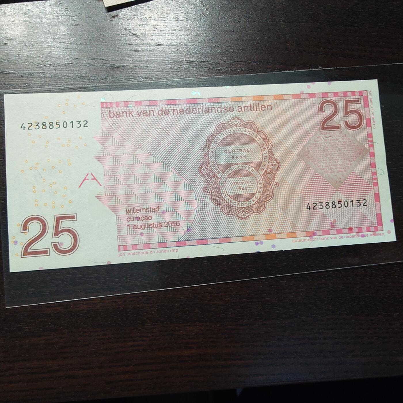 世界钱币～微拍第245期暨2026年第26期  新货卖剩品种部分上架提供选购【有看中的就一开始就出价，别为了晚付几天押金拖到最后，这里没出价的只要群里卖掉了就会撤】 2016年荷属安地列斯群岛25盾 全新绝品尾号132