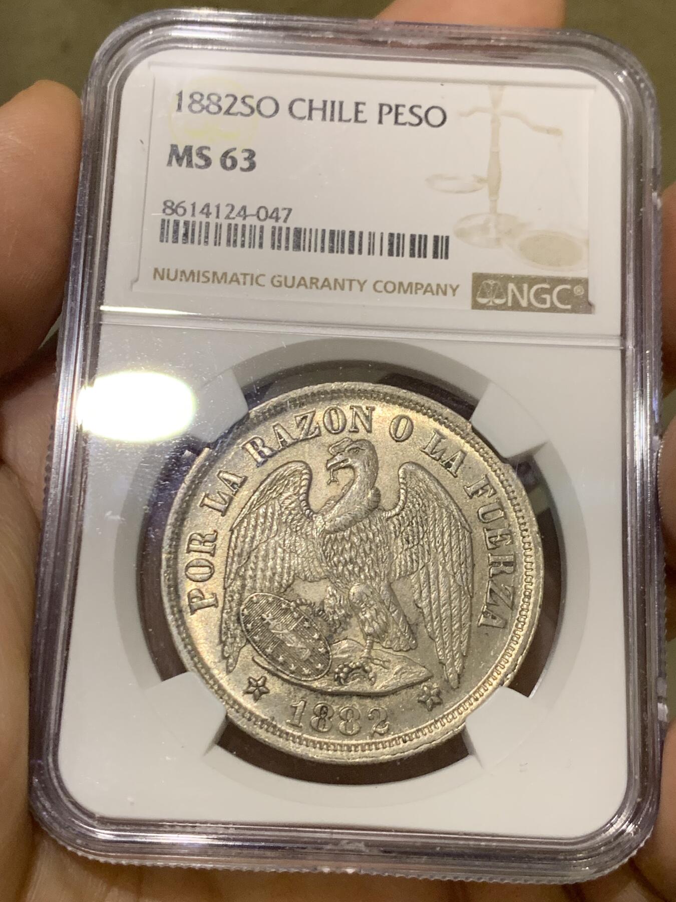 《竞宝斋》第481场 周日，周一 2场连拍 （全场包邮）20级店铺 欢迎送拍 NGC MS63 智利1882年1比索大银币