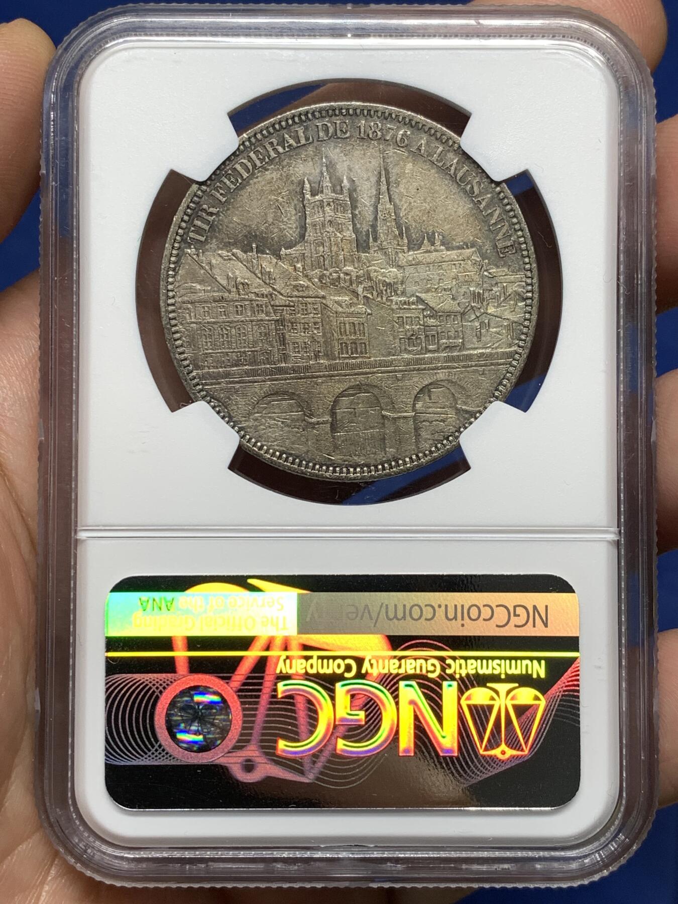 《竞宝斋》第481场 周日，周一 2场连拍 （全场包邮）20级店铺 欢迎送拍 NGC AUD 瑞士1876年洛桑射击节5法郎景观大银币