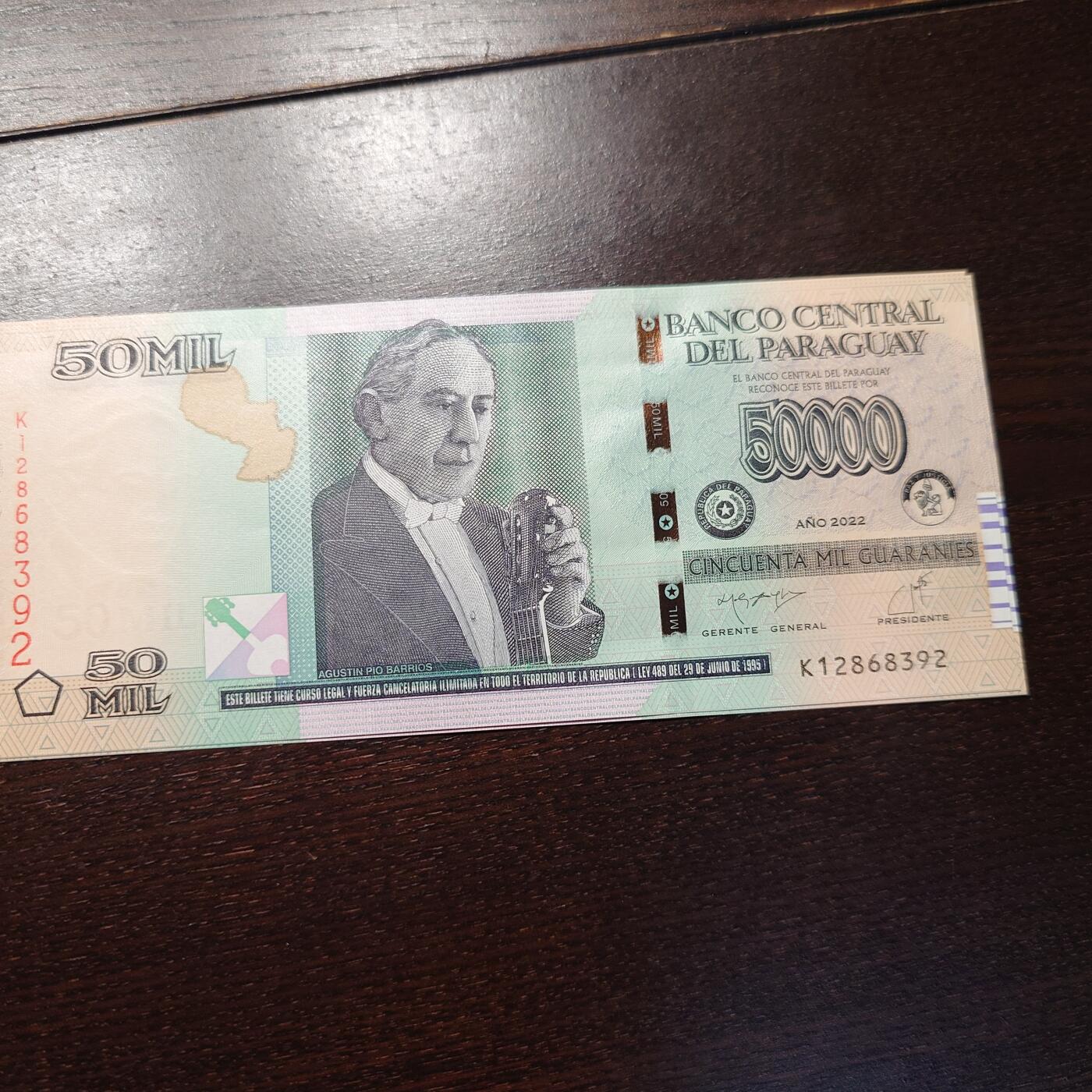 世界钱币～微拍第245期暨2026年第26期  新货卖剩品种部分上架提供选购【有看中的就一开始就出价，别为了晚付几天押金拖到最后，这里没出价的只要群里卖掉了就会撤】 2022年巴拉圭50000 全新绝品无47尾号392