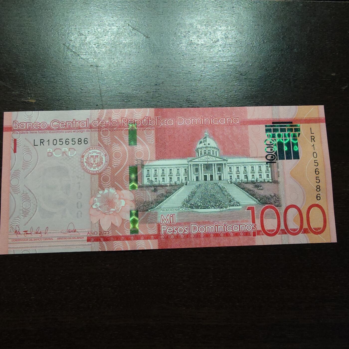 世界钱币～微拍第245期暨2026年第26期  新货卖剩品种部分上架提供选购【有看中的就一开始就出价，别为了晚付几天押金拖到最后，这里没出价的只要群里卖掉了就会撤】 2023年多米尼加1000比索 全新绝品无47尾号586