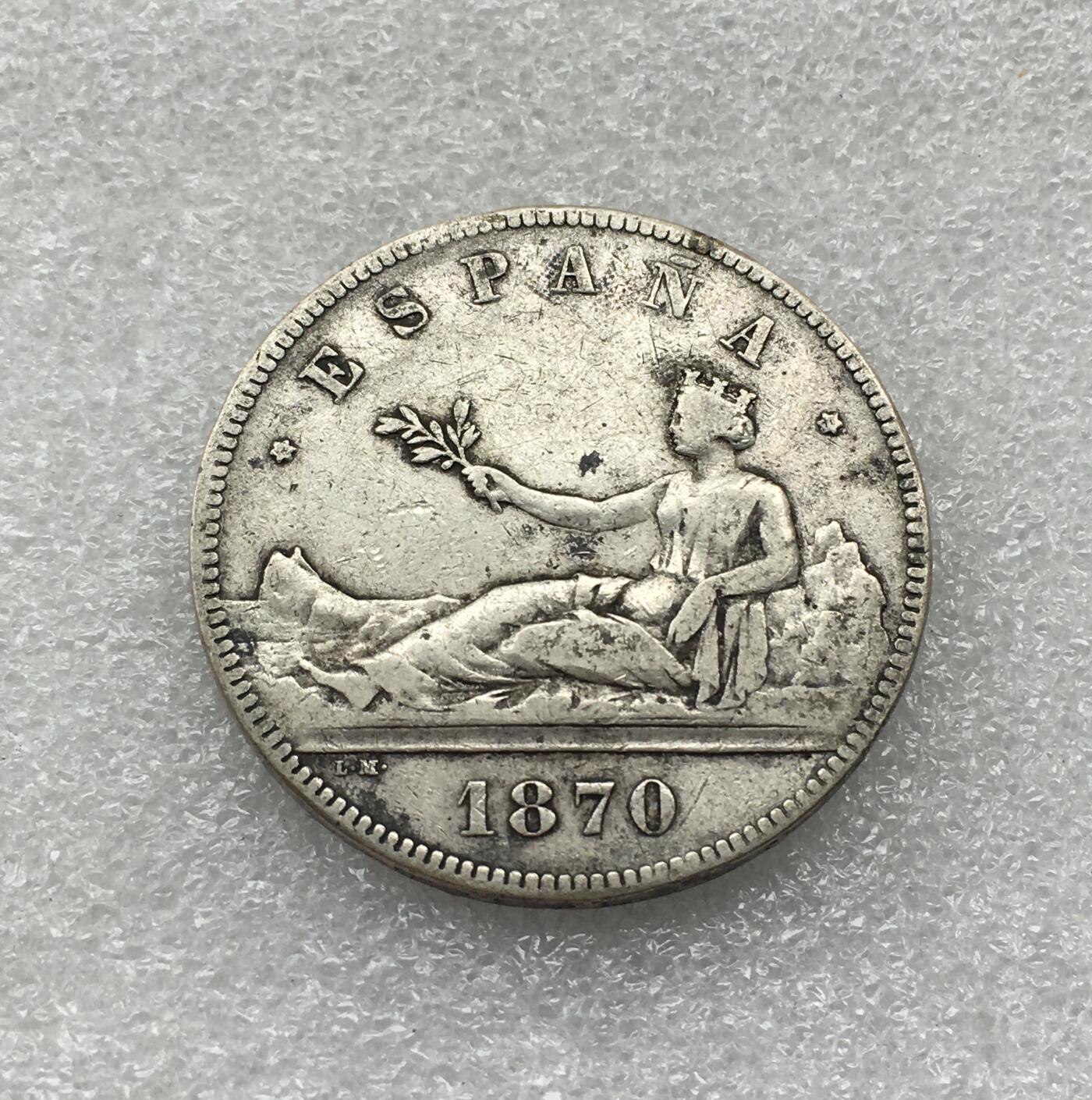 世界钱币专场拍卖 每周二开拍 1870年西班牙拿花女神5比赛塔双柱银币