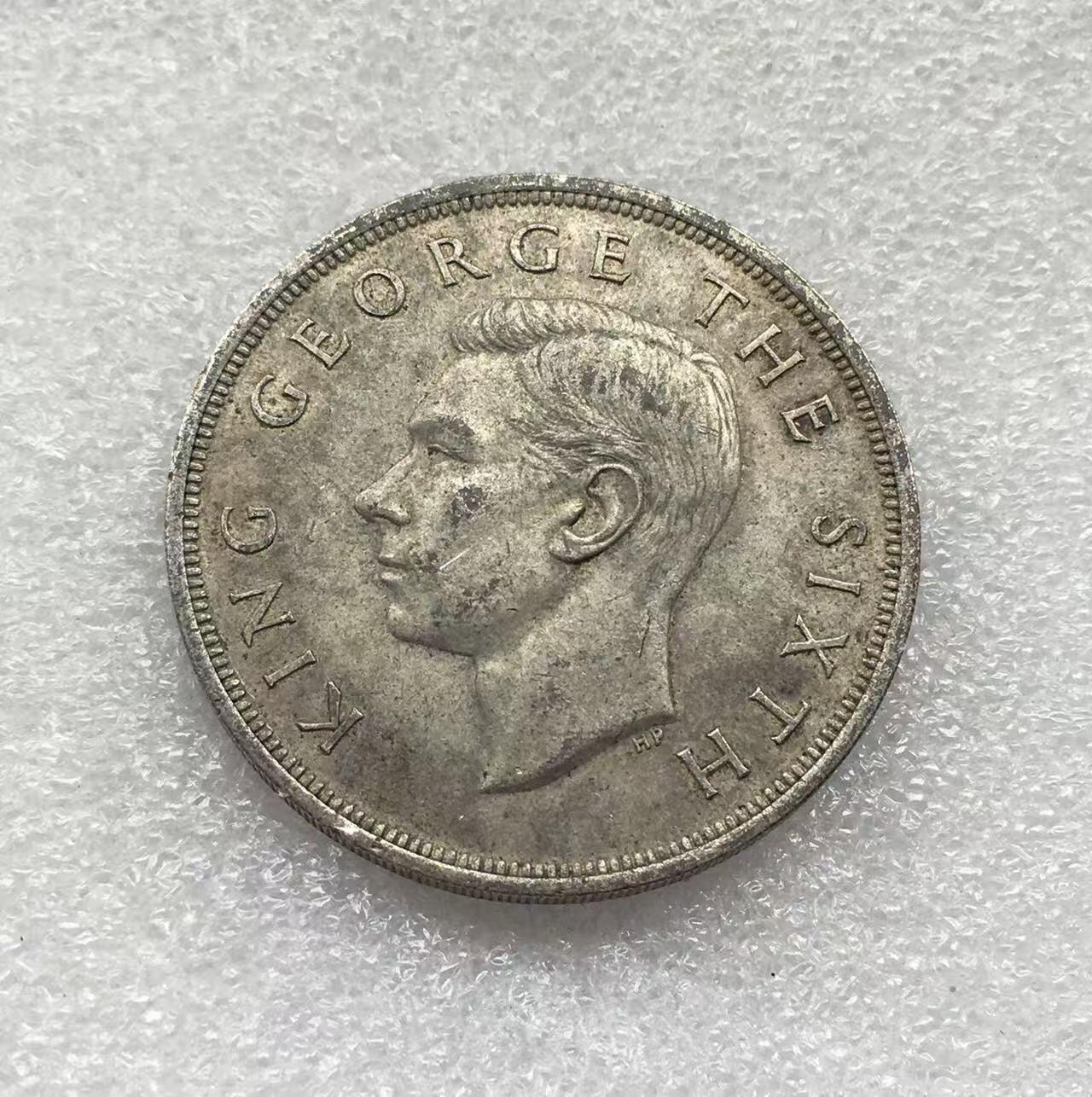 世界钱币专场拍卖 每周二开拍 1949年新西兰乔治六世一克朗银币