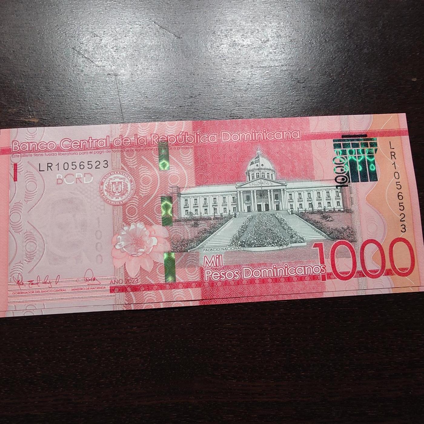 世界钱币～微拍第245期暨2026年第26期  新货卖剩品种部分上架提供选购【有看中的就一开始就出价，别为了晚付几天押金拖到最后，这里没出价的只要群里卖掉了就会撤】 2023年多米尼加1000比索 全新绝品无47尾号523