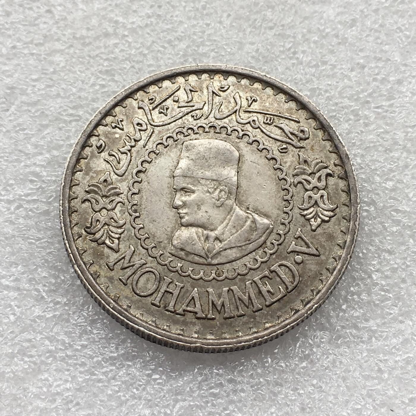 世界钱币专场拍卖 每周二开拍 1956年摩洛哥500法郎银币 22克  底板有点歪 介意勿拍