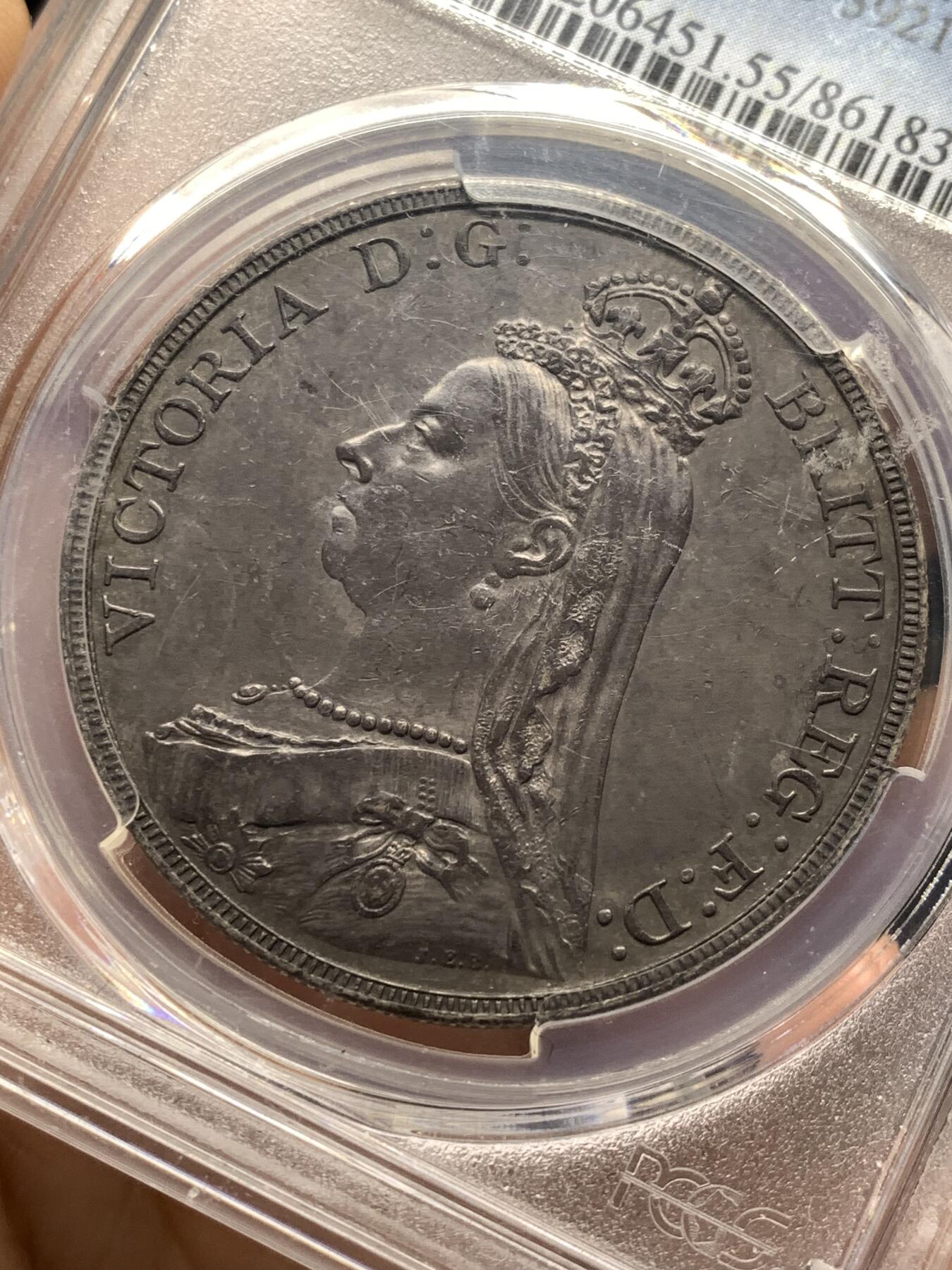 《竞宝斋》第481场 周日，周一 2场连拍 （全场包邮）20级店铺 欢迎送拍 PCGS AU55 英国1887年高冠马剑，均匀的深紫色包浆，有分不易。很有特色的一枚马剑，按国币的审美是顶级的味道币。