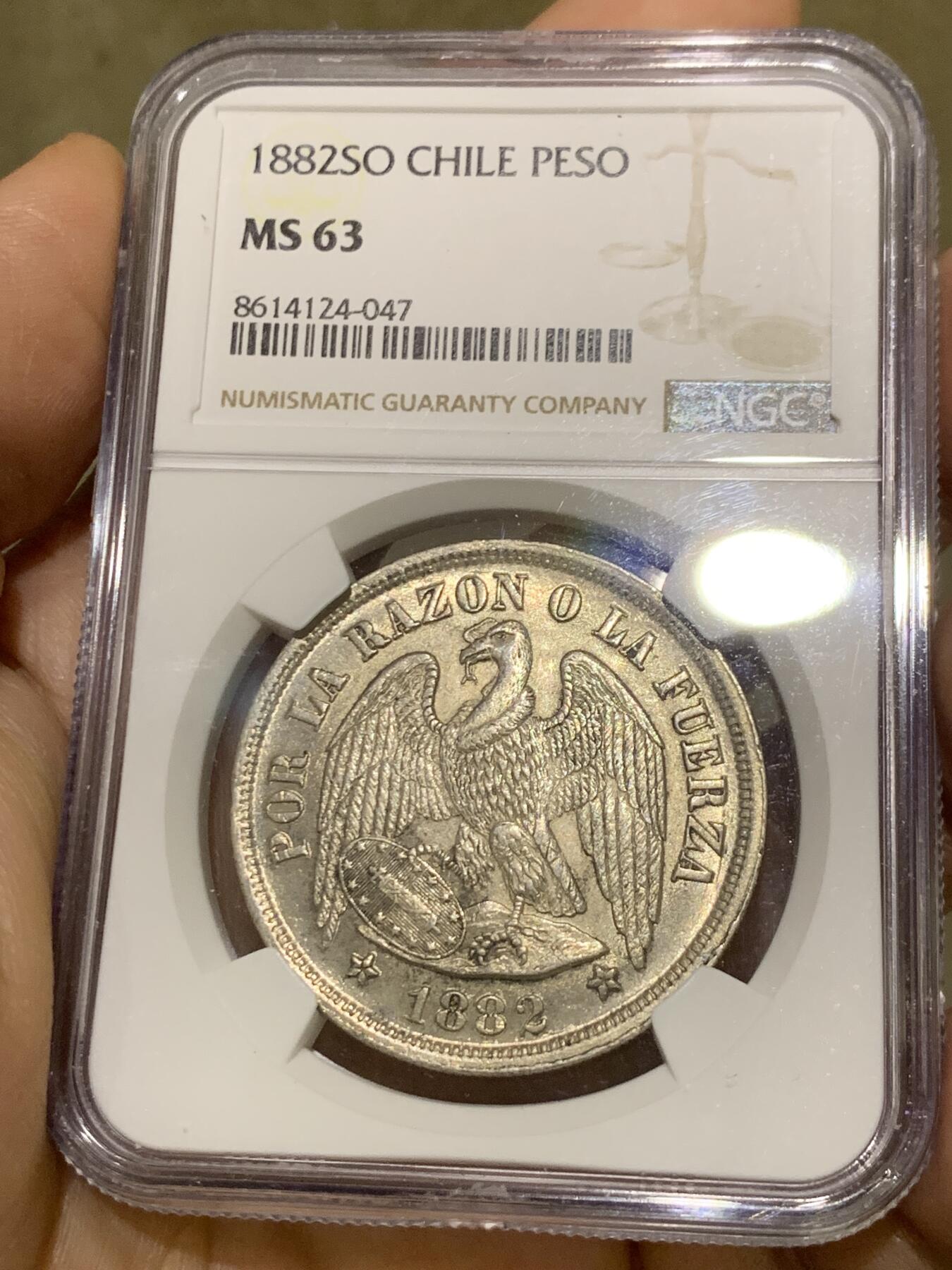 《竞宝斋》第481场 周日，周一 2场连拍 （全场包邮）20级店铺 欢迎送拍 NGC MS63 智利1882年1比索大银币