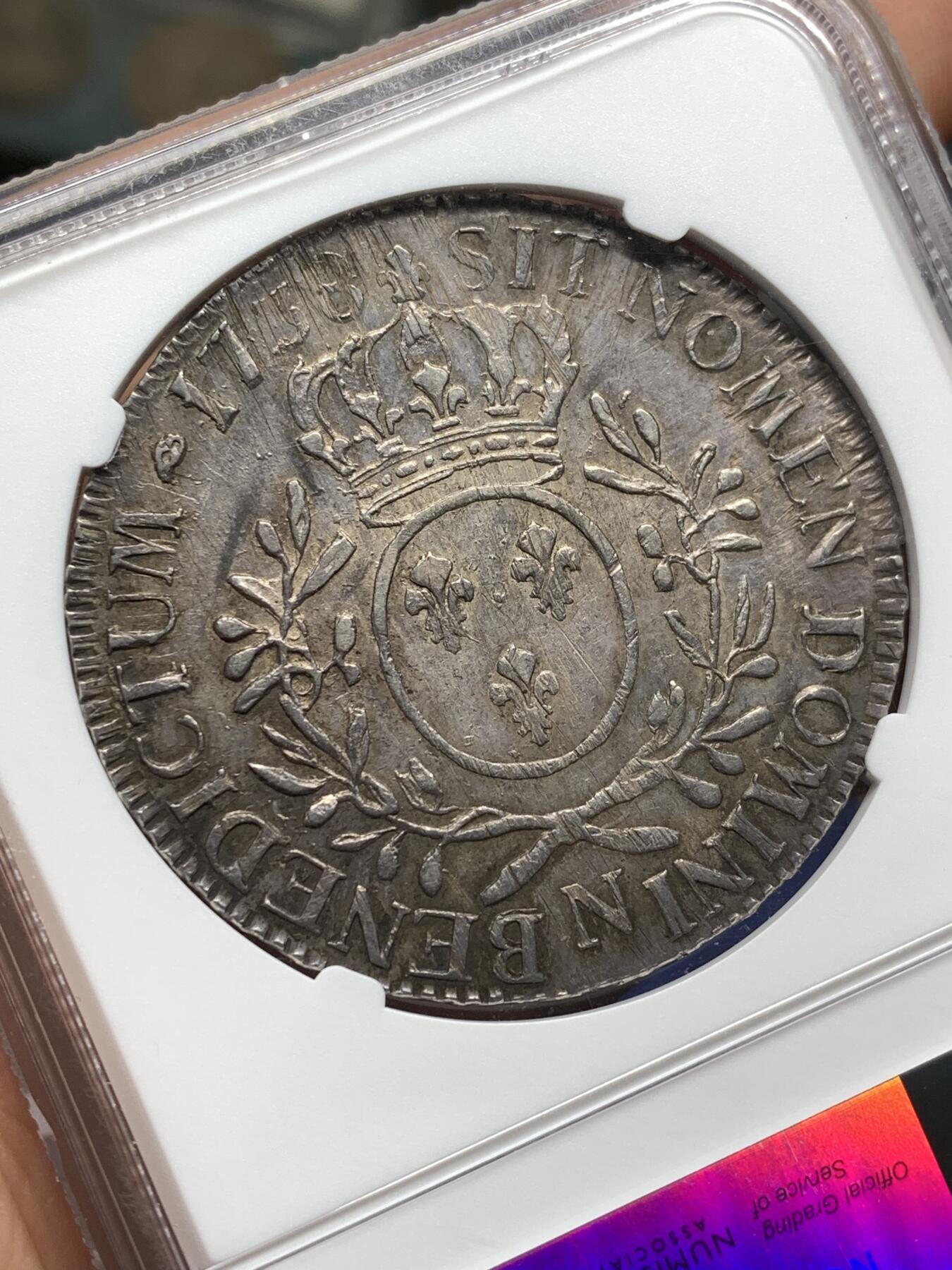 《竞宝斋》第481场 周日，周一 2场连拍 （全场包邮）20级店铺 欢迎送拍 唯一冠军分 NGC AU55 法国路易十五1738N埃居大银币 青年版背橄榄枝，1738年N厂 Montpellier 铸造，少见小厂唯一评级记录。状态很好细节拉满。