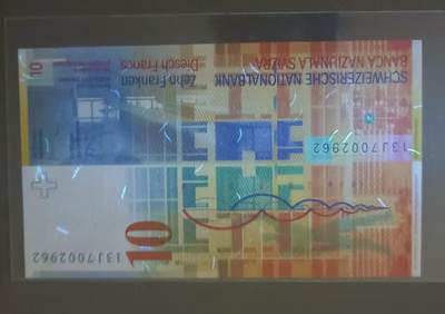 得物收藏 Chase Auction 第37期 - - 外钞、银元、民国钞和人民币混合场！ 持续更新！ 瑞士头版10法郎UNC，13J7002962，加拿大2013年5元塑料钞UNC，HCJ4812886两枚同拍！如图发货！