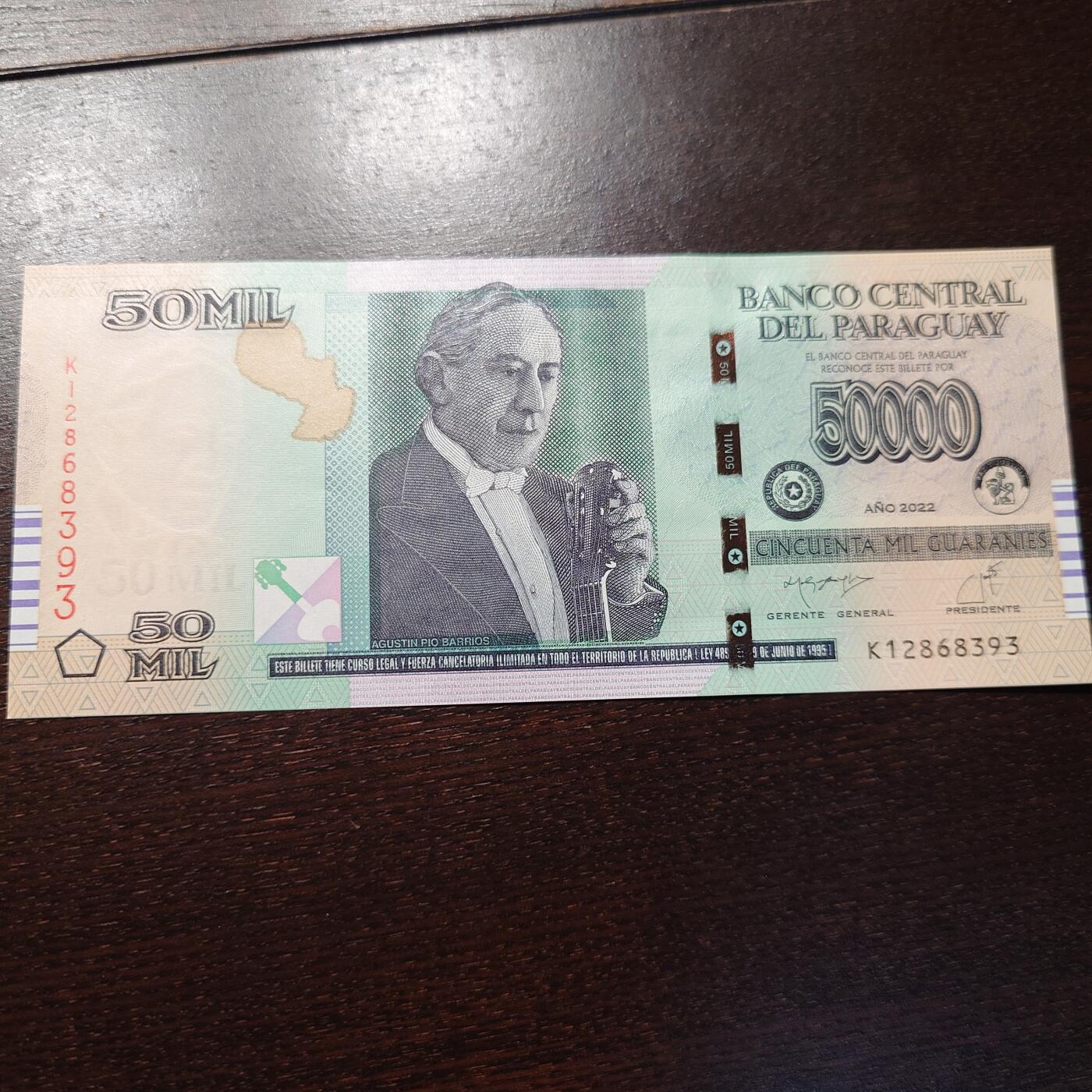 世界钱币～微拍第245期暨2026年第26期  新货卖剩品种部分上架提供选购【有看中的就一开始就出价，别为了晚付几天押金拖到最后，这里没出价的只要群里卖掉了就会撤】 2022年巴拉圭50000 全新绝品无47尾号393