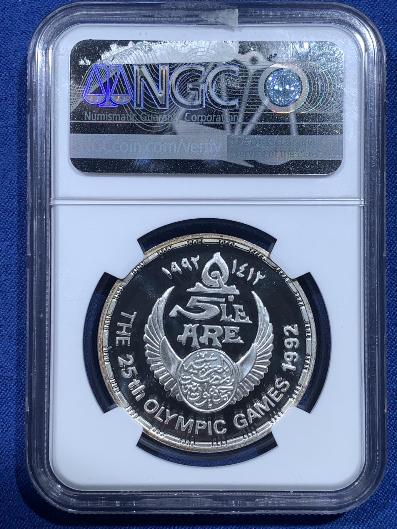 《竞宝斋》第482场 周日，周一 2场连拍 （全场包邮）20级店铺 欢迎送拍 NGC PF68UC 埃及1992奥运会曲棍球5磅精制银币