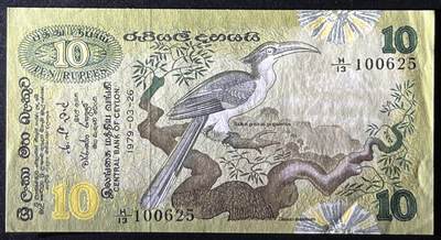 小福收藏拍卖第205期 裸钞场 本期有多张豹子号靓号  大量民国钞 百慕大样钞洋葱冠全套  阿富汗首年份查希尔国王和独立纪念碑 仅发行1000枚亚克力砖封蒙古20000图格里克帝国800周年纪念钞 卢旺达 东加勒比 斯里兰卡等多国精美纸币 斯里兰卡 锡兰 1979年 10卢比 无47 aunc