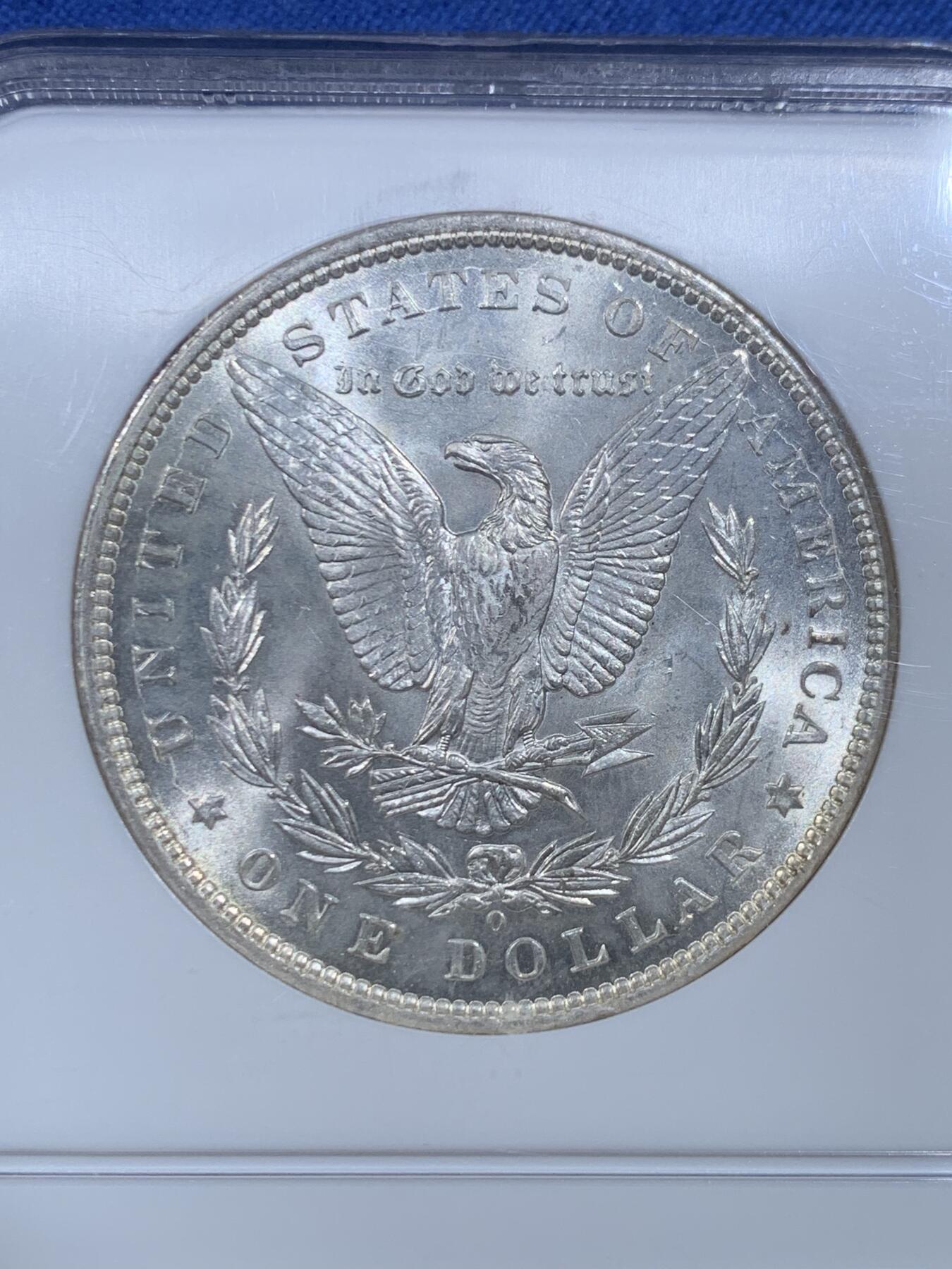 《竞宝斋》第482场 周日，周一 2场连拍 （全场包邮）20级店铺 欢迎送拍 NGC MS64 美国1899年O版摩根银币，老盒严评，十字光