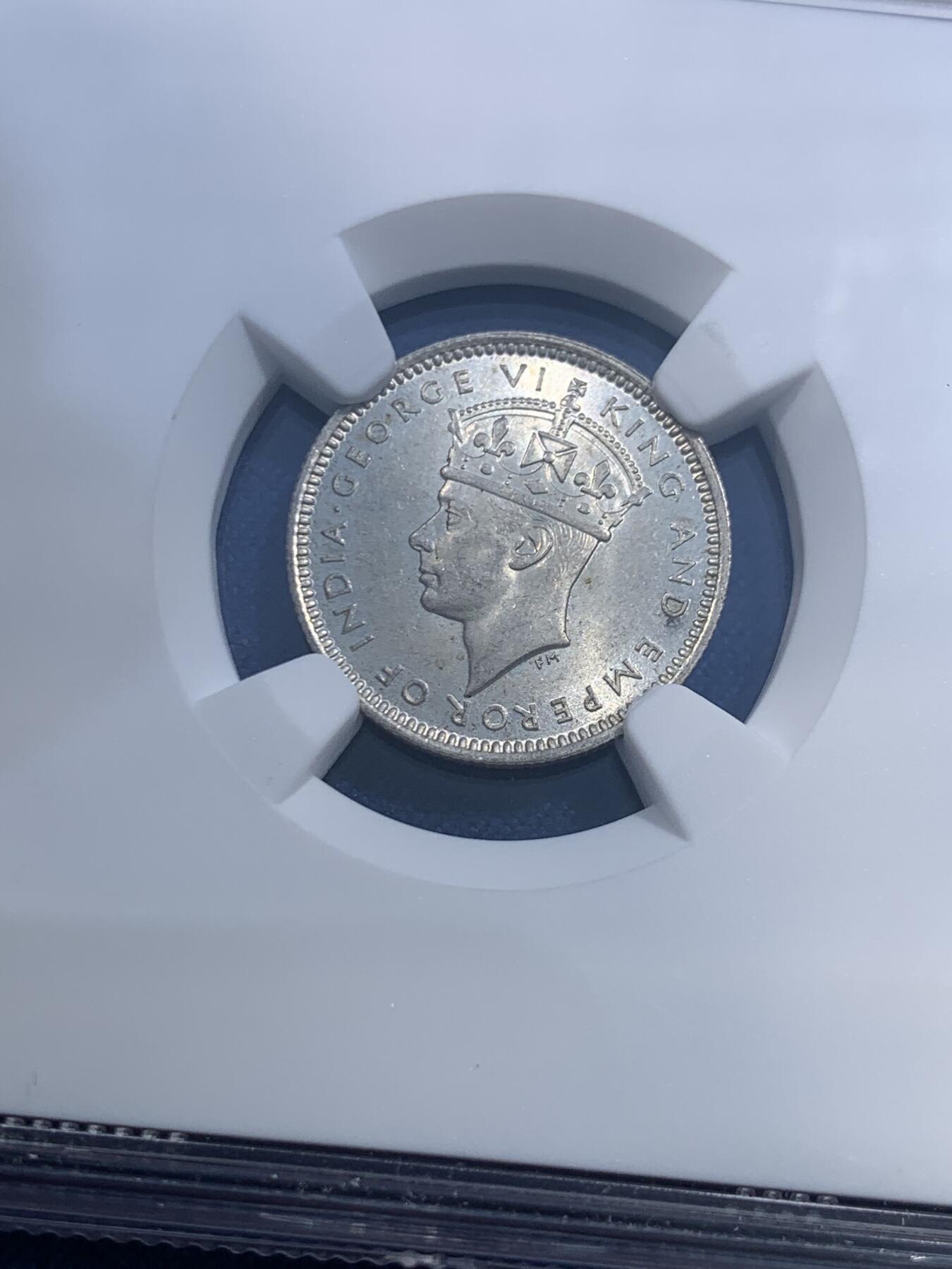 《竞宝斋》第482场 周日，周一 2场连拍 （全场包邮）20级店铺 欢迎送拍 NGC MS65 马来亚1941年乔六10分银币 少见卷拆BU状态，状态和分数都很难得