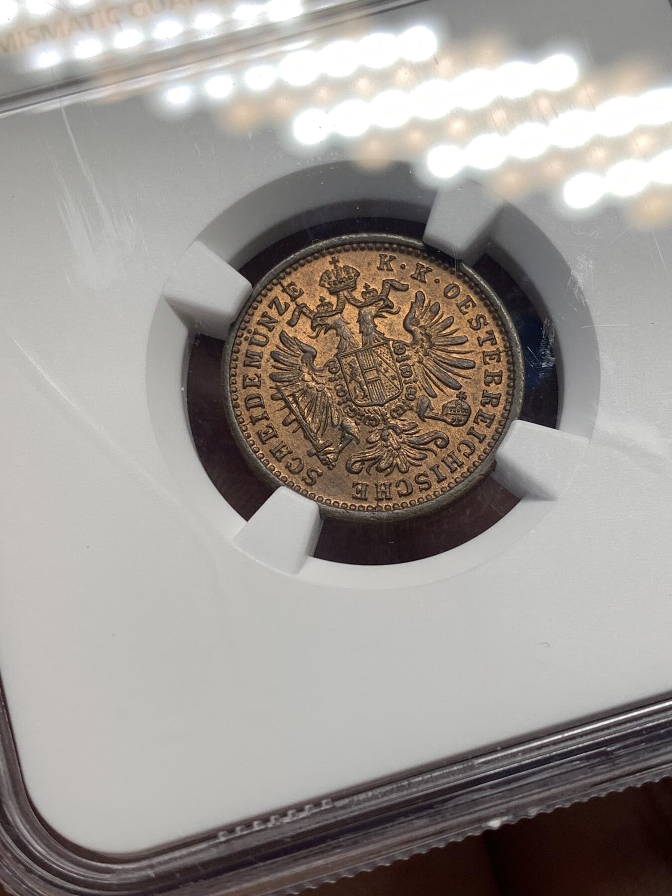 《竞宝斋》第482场 周日，周一 2场连拍 （全场包邮）20级店铺 欢迎送拍 NGC MS63RB 奥地利1891年1克鲁泽铜币，原光状态小铜币