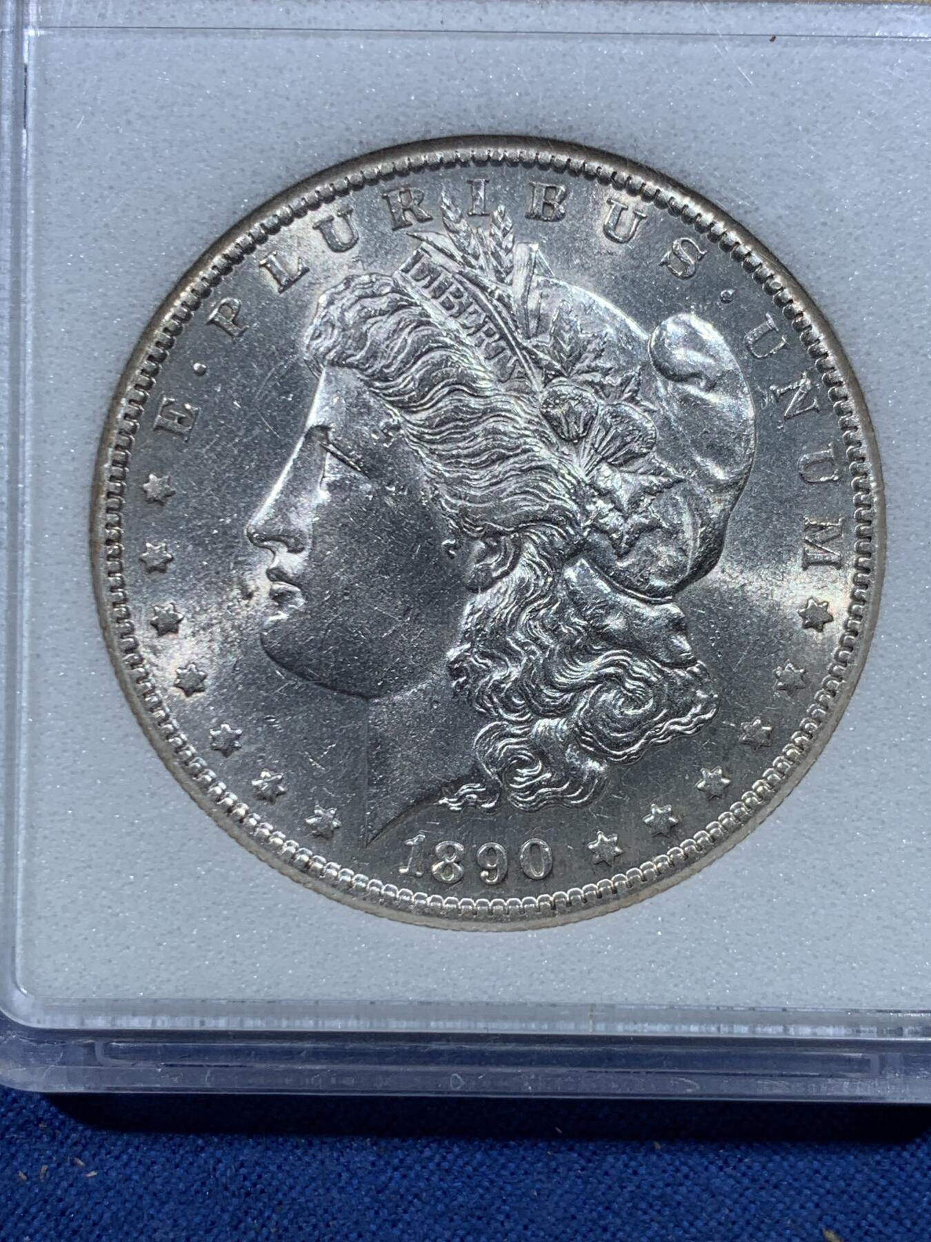 《竞宝斋》第482场 周日，周一 2场连拍 （全场包邮）20级店铺 欢迎送拍 SGS MS63 美国1890年摩根1美元银币 少见的封装盒 细节见图