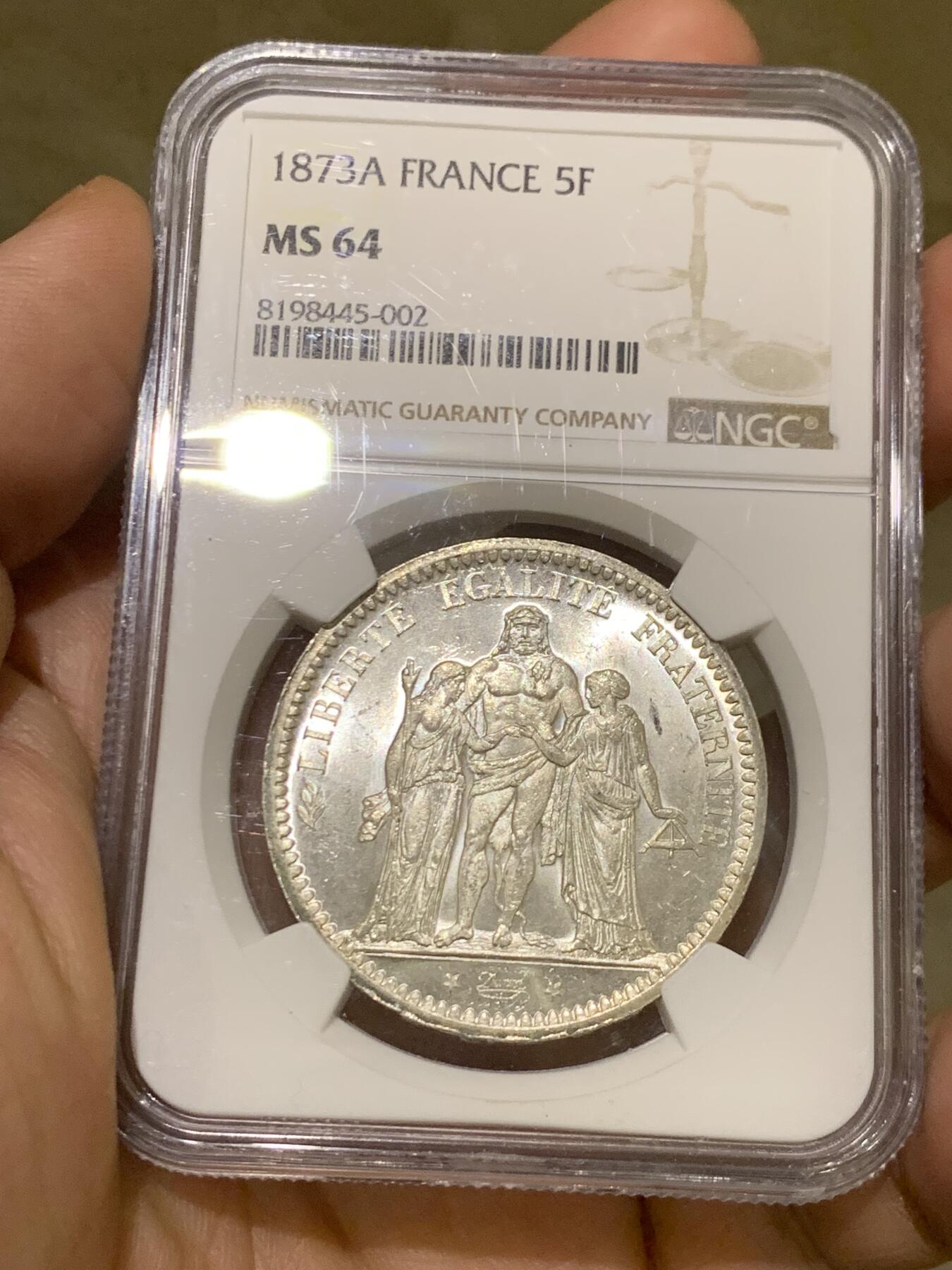 《竞宝斋》第482场 周日，周一 2场连拍 （全场包邮）20级店铺 欢迎送拍 NGC MS64 法国 法兰西第三共和国1873A大力神5法郎银币 好品好质感 分数也不错