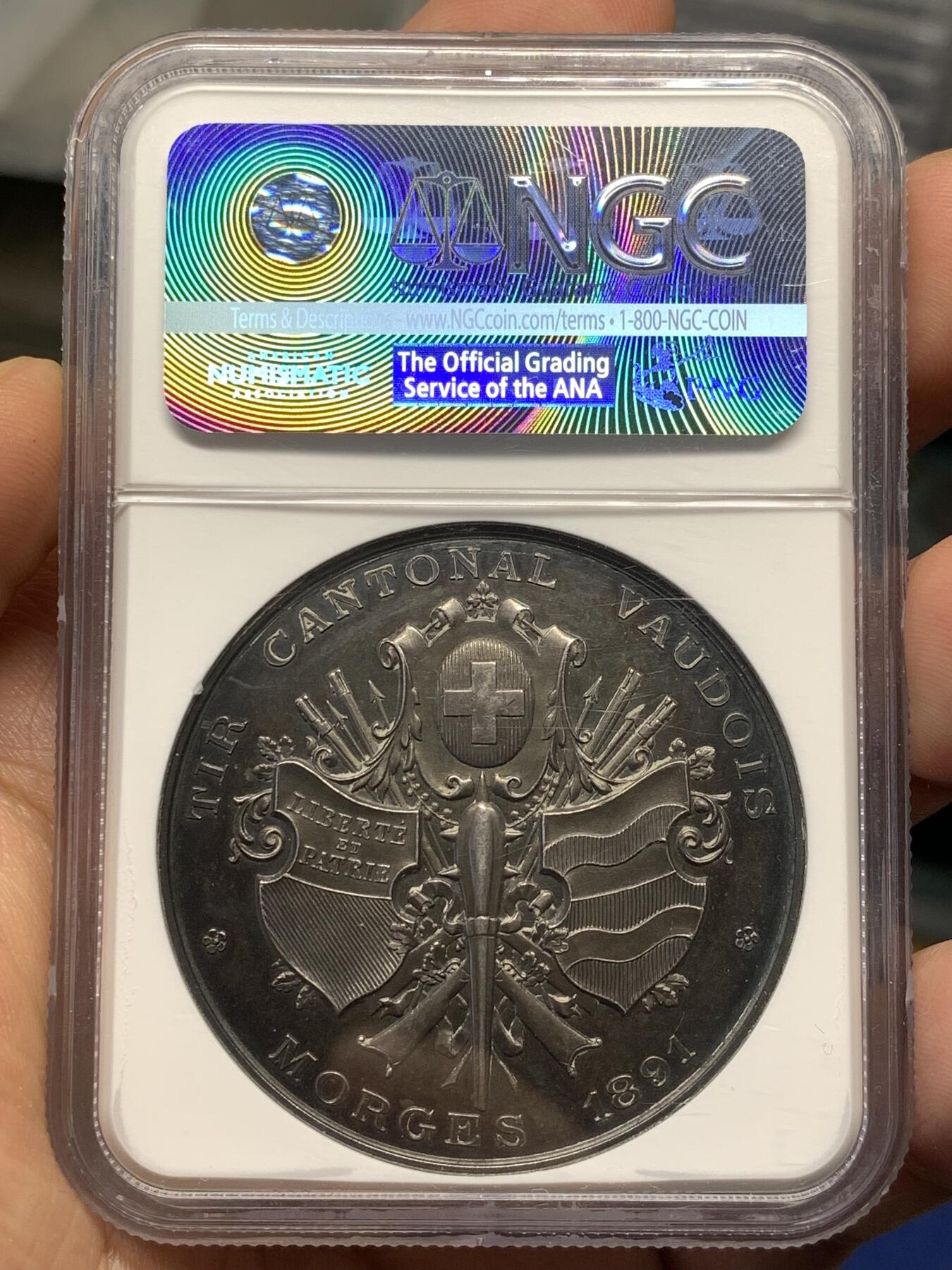 《竞宝斋》第482场 周日，周一 2场连拍 （全场包邮）20级店铺 欢迎送拍 NGC MS63 瑞士1891年莫尔日射击节大银章，少见品种。 45mm，38.65克。华丽的深彩包浆，非常漂亮，非常难得。