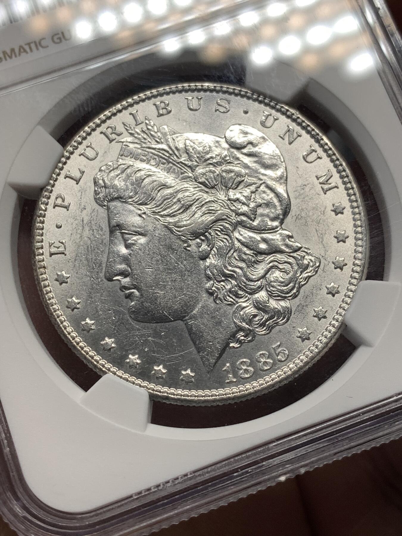 《竞宝斋》第482场 周日，周一 2场连拍 （全场包邮）20级店铺 欢迎送拍 NGC AU55 美国1885年摩根1美元银币