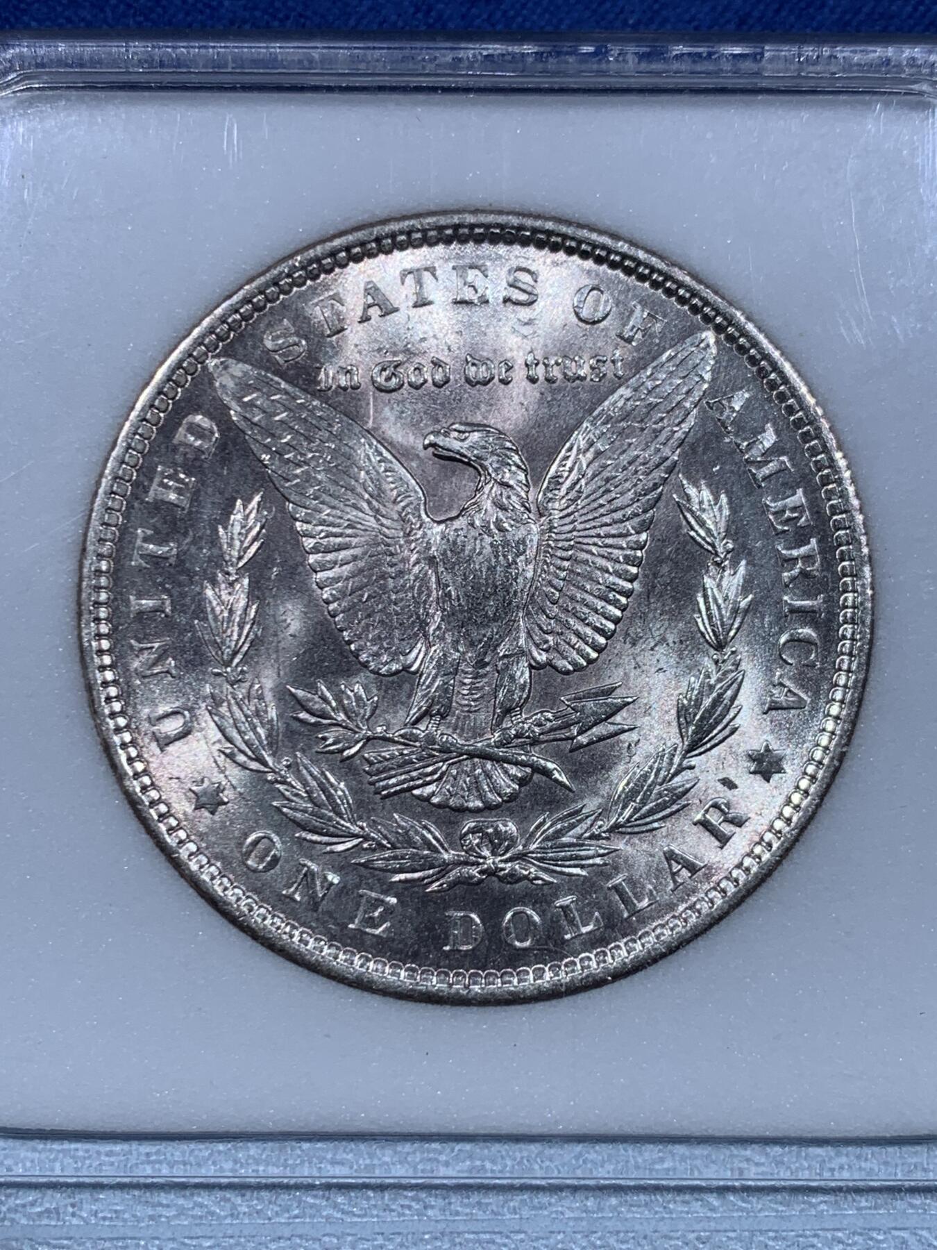 《竞宝斋》第482场 周日，周一 2场连拍 （全场包邮）20级店铺 欢迎送拍 NNC MS65 美国1889年摩根银币 凝夜紫均匀环彩视觉效果极佳 细节见图