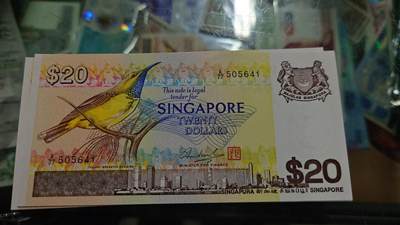 世界钱币～微拍第246期暨2026年第27期  少量老库存低价起拍 1979年新加坡鸟版20元 全新绝品尾号641