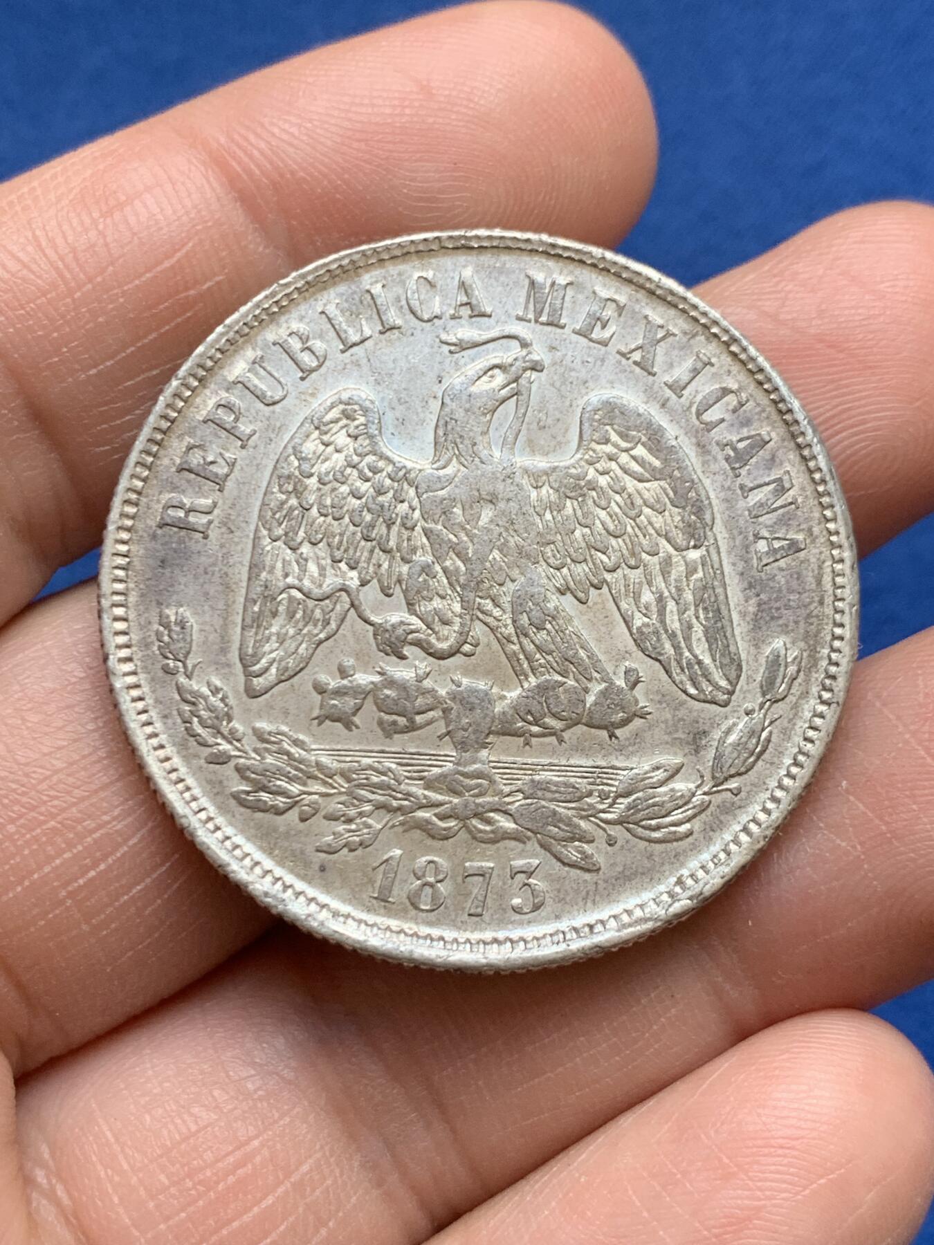 《竞宝斋》第482场 周日，周一 2场连拍 （全场包邮）20级店铺 欢迎送拍 墨西哥1873年天平鹰洋1比索大银币，好品深打，有戳记。