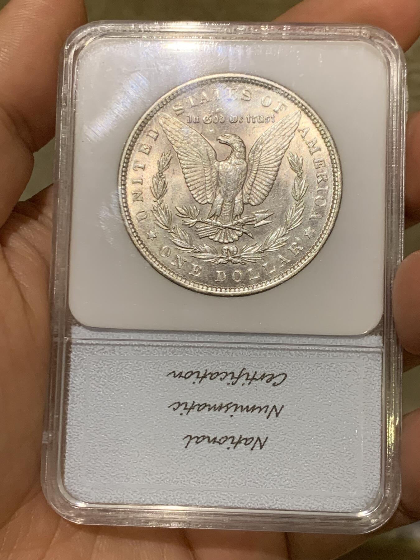 《竞宝斋》第482场 周日，周一 2场连拍 （全场包邮）20级店铺 欢迎送拍 NNC MS65 美国1889年摩根银币 凝夜紫均匀环彩视觉效果极佳 细节见图