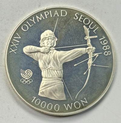 S&S Numismatic世界钱币-拍卖 第126期  韩国1987年 汉城奥运会-射箭 10000韩元精制纪念银币 33.63克925银  品相如图，裸币