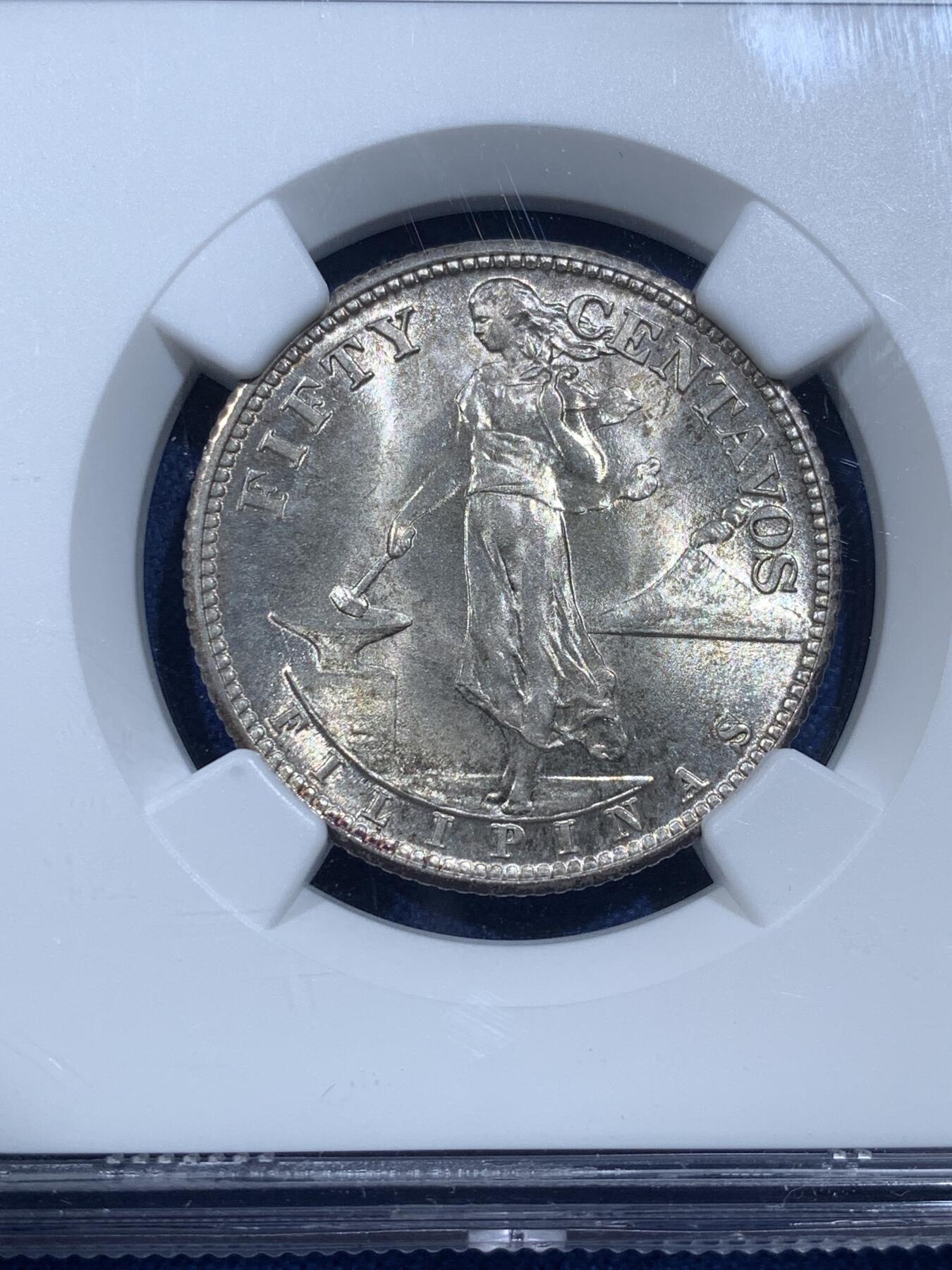 《竞宝斋》第482场 周日，周一 2场连拍 （全场包邮）20级店铺 欢迎送拍 NGC MS65 美属菲律宾1944年打铁女神50分银币，本品种的超高分，爆光，底板丝滑，设计优美