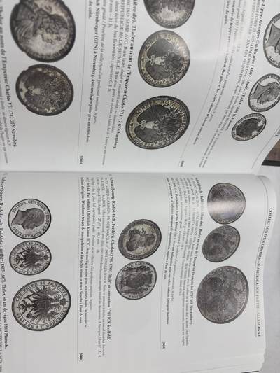 文馨钱币收藏第 303 场，【五一钱币荟，收藏盛宴】长期接代拍业务 世界各国各朝各代货币介绍目录大全附带价格表，应有尽有，全书共 704 页，非常厚重，约几公斤，不包邮，中拍实收快递邮费