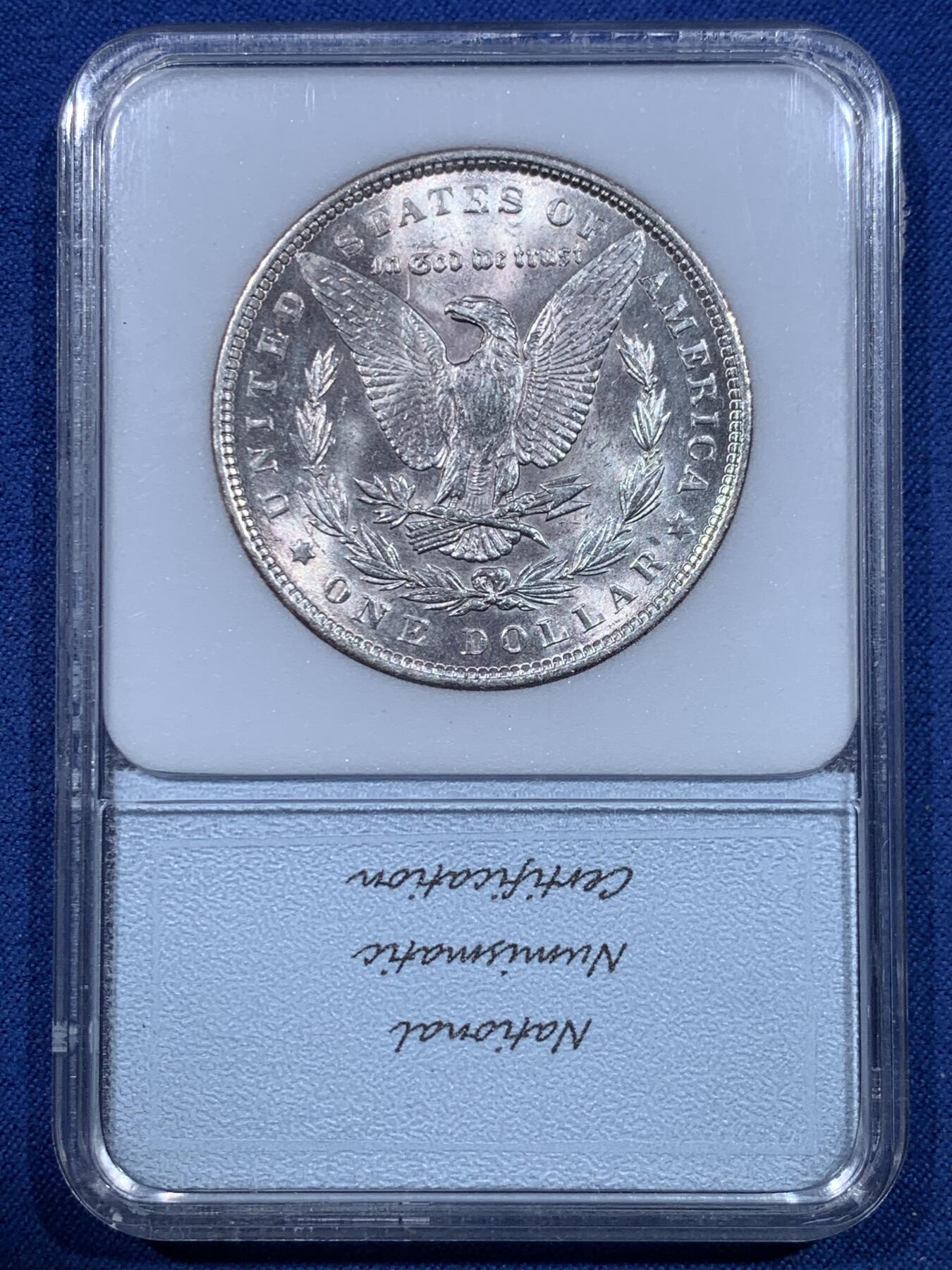 《竞宝斋》第482场 周日，周一 2场连拍 （全场包邮）20级店铺 欢迎送拍 NNC MS65 美国1889年摩根银币 凝夜紫均匀环彩视觉效果极佳 细节见图