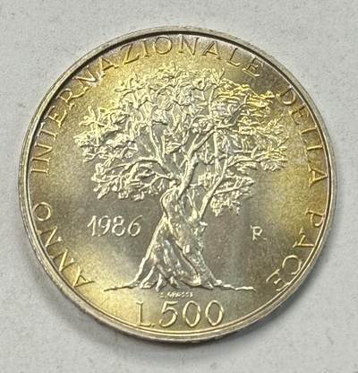 S&S Numismatic世界钱币-拍卖 第126期  意大利1986年 国际和平年 500里拉纪念银币 11克835银 淡淡的黄油包浆，裸币